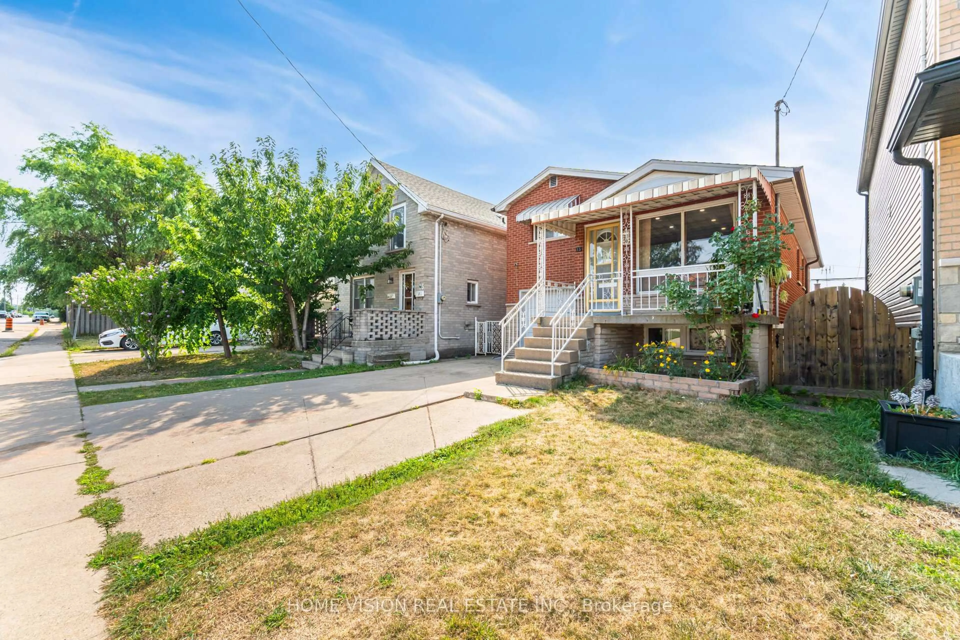 Home with brick exterior material, street for 15 Adair Ave, Hamilton Ontario L8H 6A5