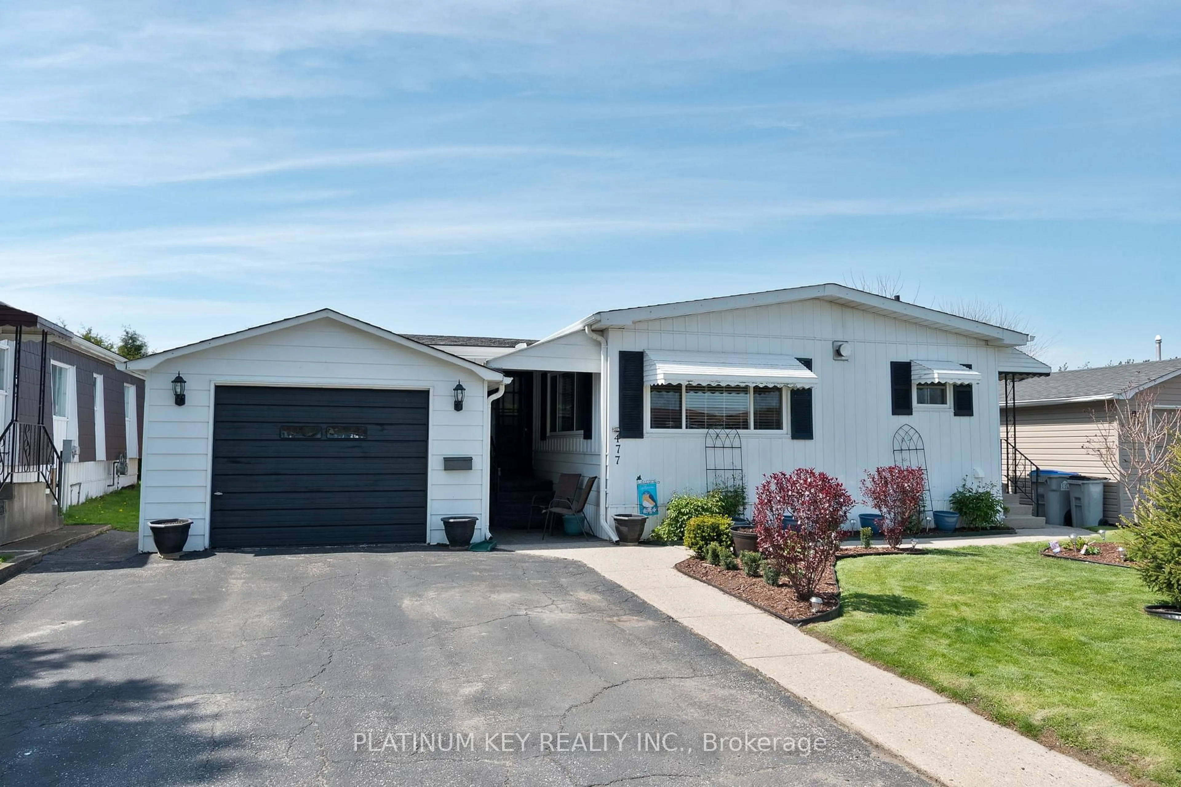 Home with vinyl exterior material, street for 477 Richard Cres, Strathroy-Caradoc Ontario N7G 3P4