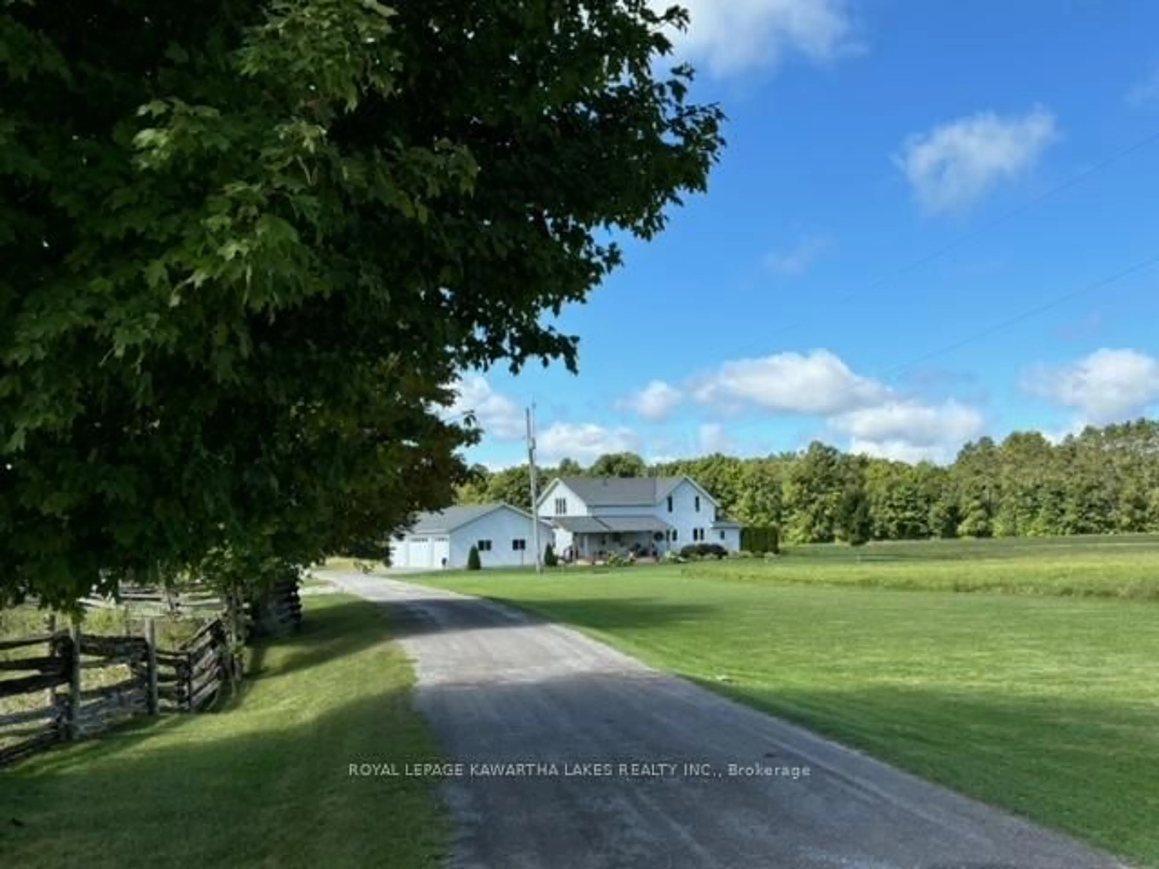 A pic from outside/outdoor area/front of a property/back of a property/a pic from drone, water/lake/river/ocean view for 2433 County Road 121 Rd, Kawartha Lakes Ontario K0M 1C0