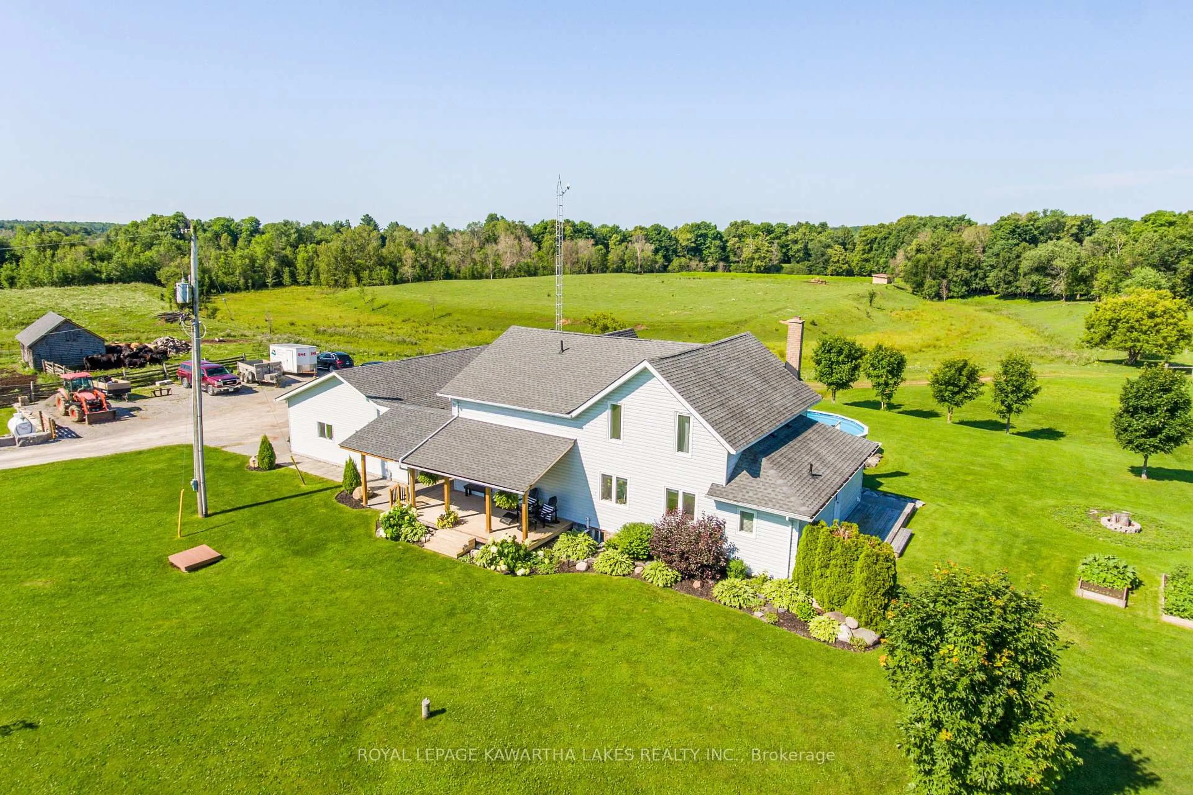 A pic from outside/outdoor area/front of a property/back of a property/a pic from drone, unknown for 2433 County Road 121 Rd, Kawartha Lakes Ontario K0M 1C0