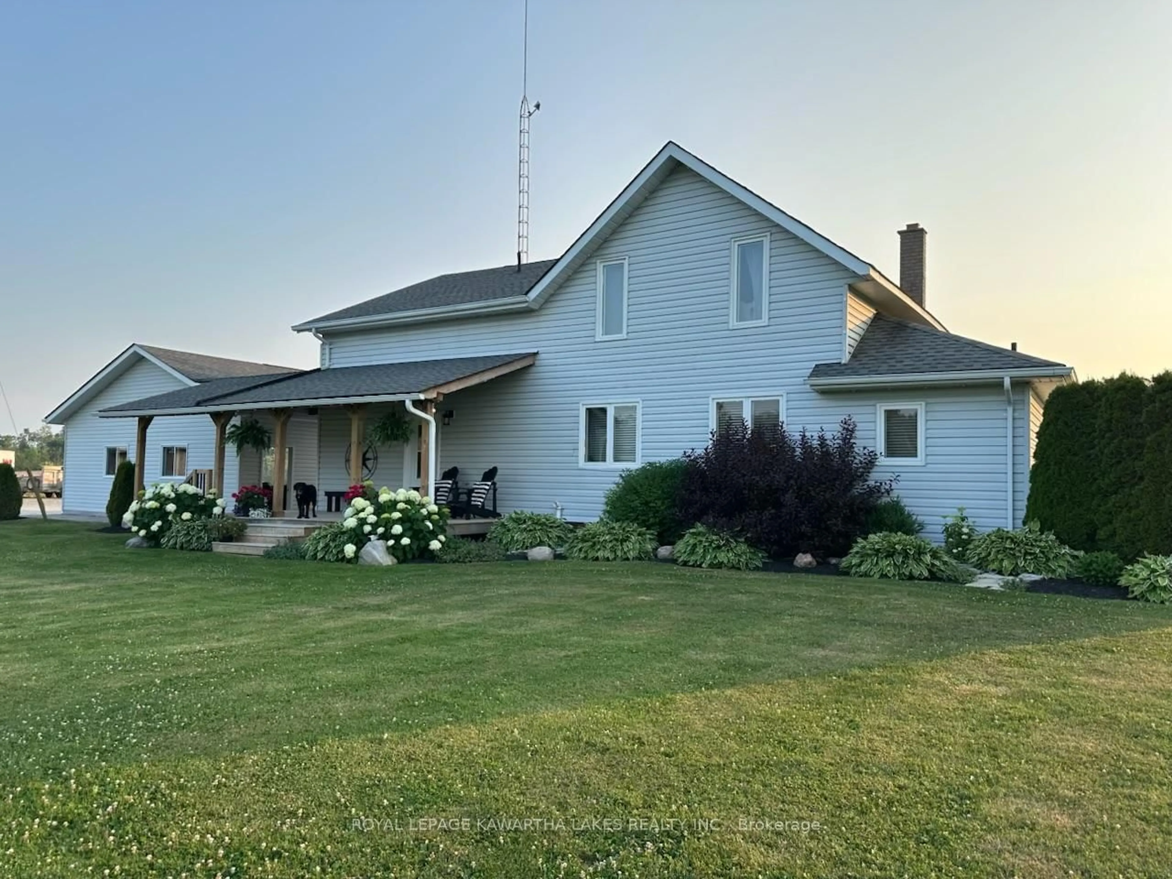 A pic from outside/outdoor area/front of a property/back of a property/a pic from drone, unknown for 2433 County Road 121 Rd, Kawartha Lakes Ontario K0M 1C0