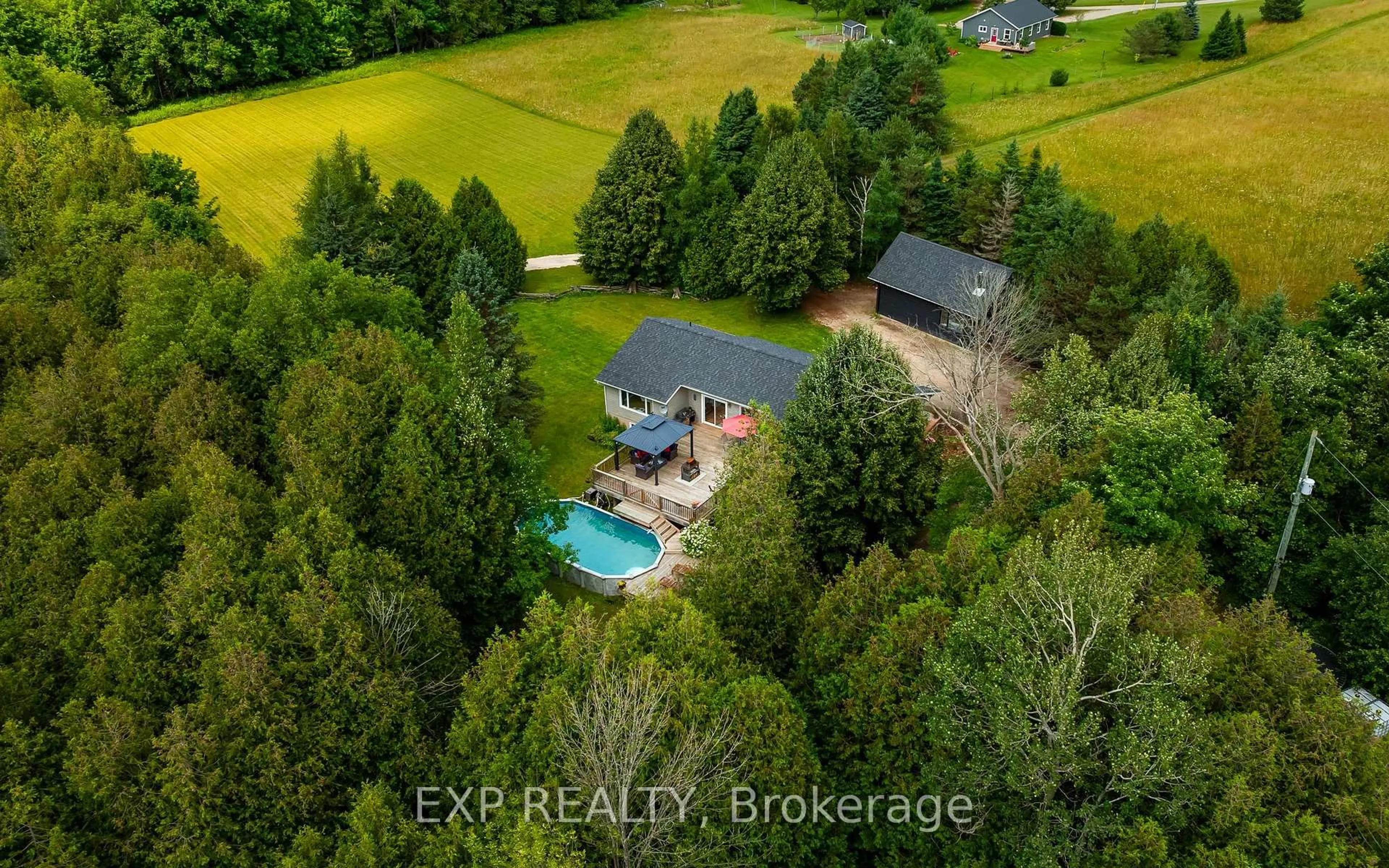 A pic from outside/outdoor area/front of a property/back of a property/a pic from drone, water/lake/river/ocean view for 506097 Highway 89, Mulmur Ontario L9V 0N6