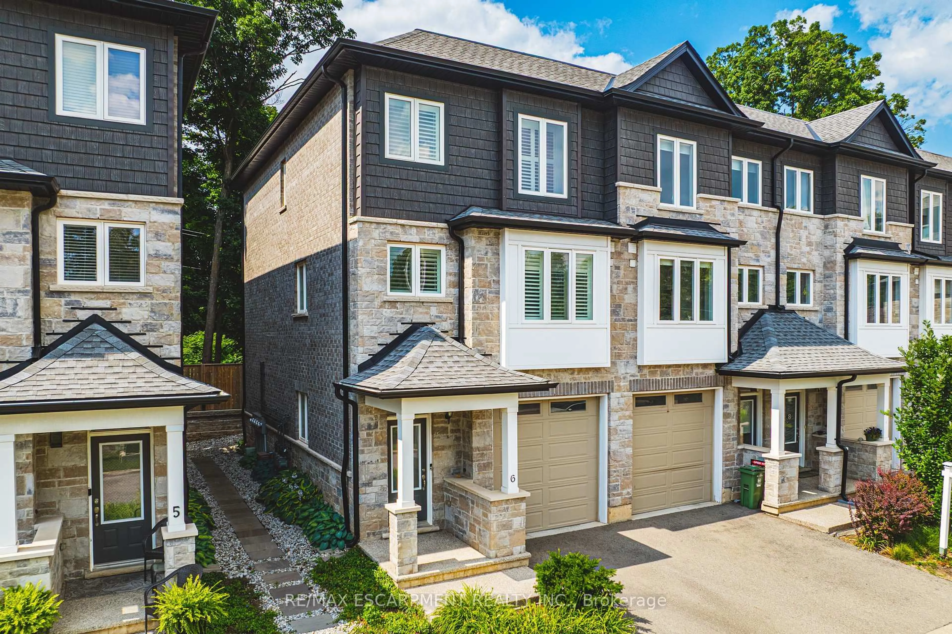 Home with brick exterior material, street for 111 Wilson St #6, Hamilton Ontario L9B 2G7
