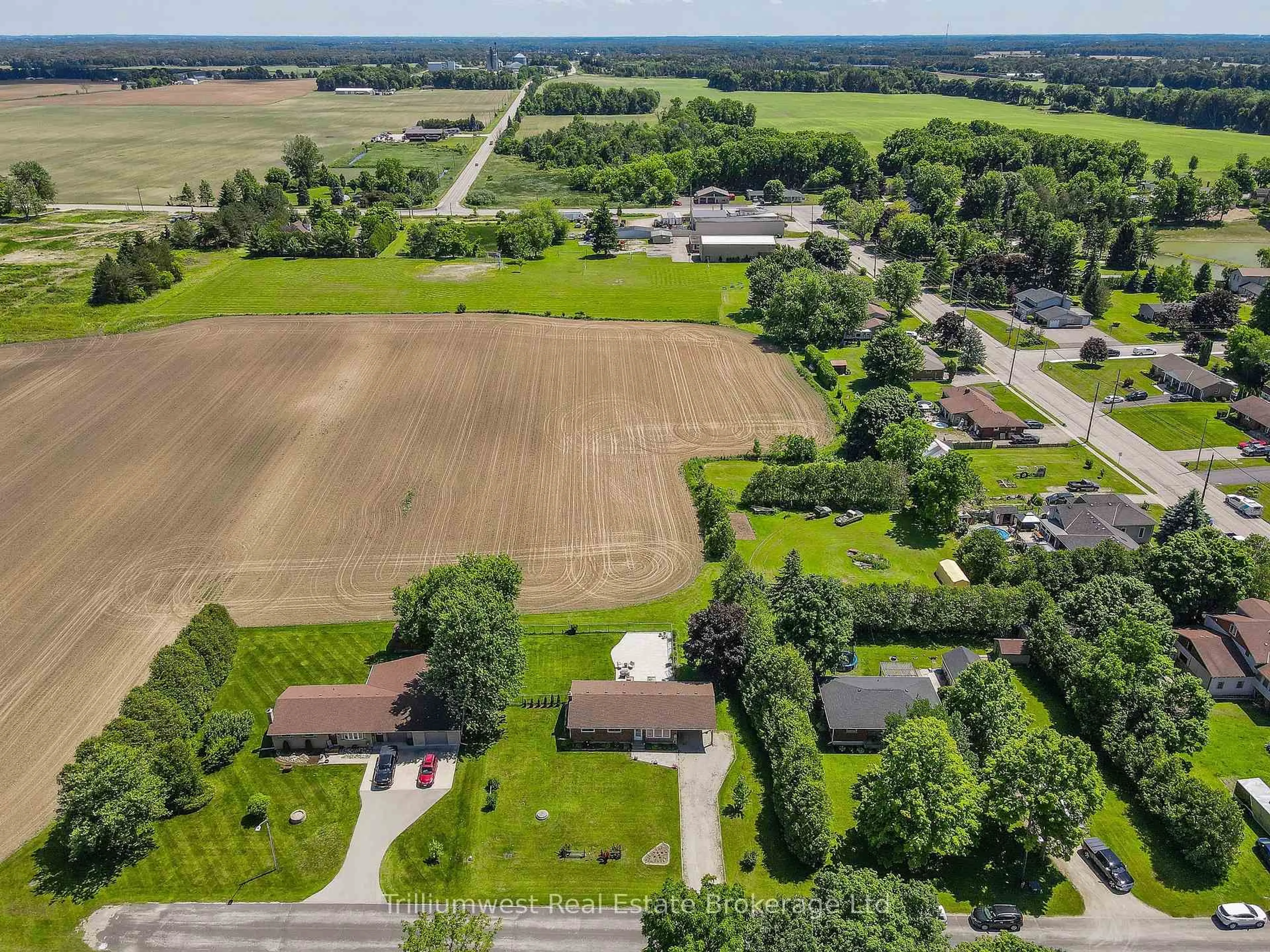 A pic from outside/outdoor area/front of a property/back of a property/a pic from drone, street for 21 Emma St, Blandford-Blenheim Ontario N0J 1V0