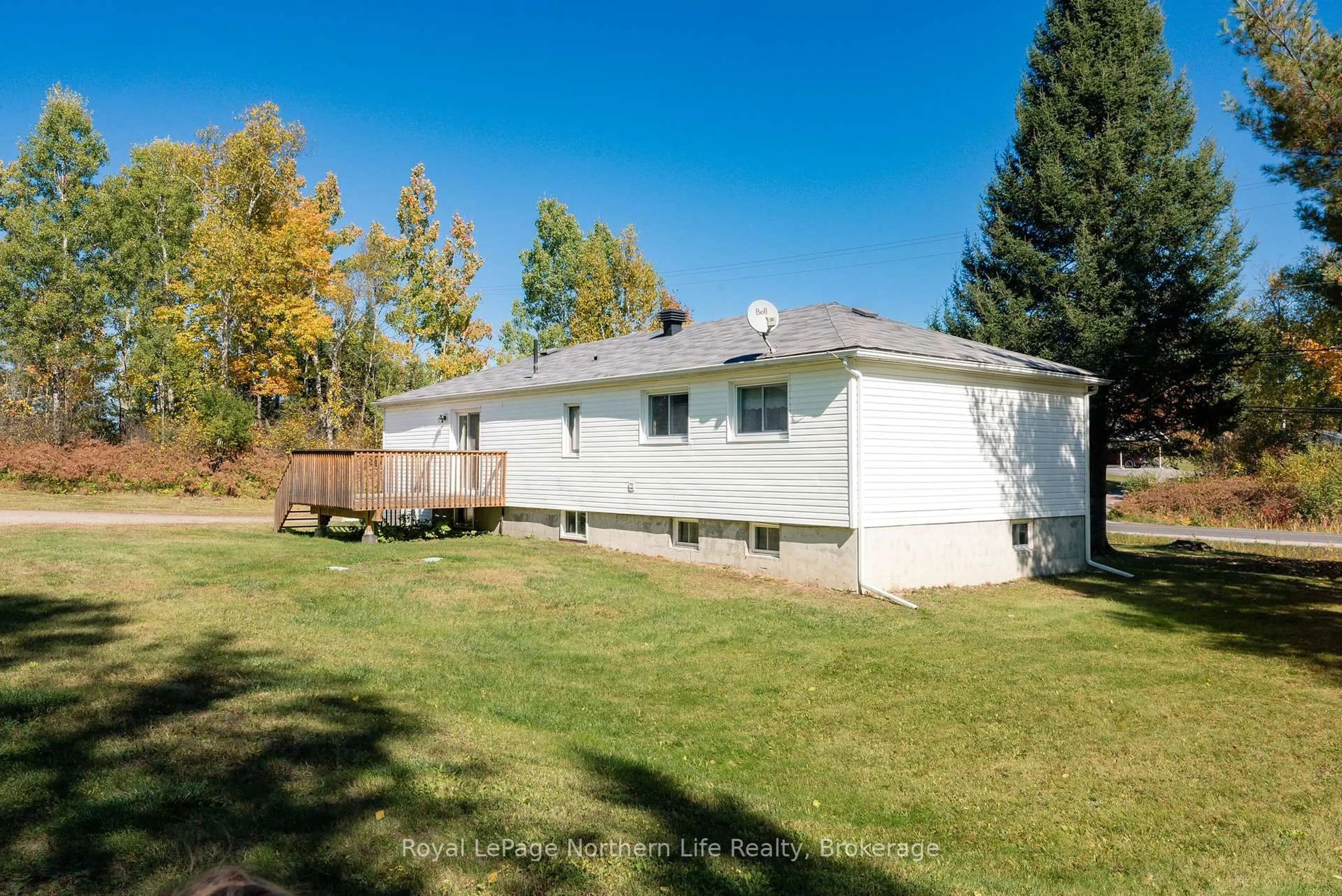 Home with vinyl exterior material, street for 92 Highway 94, East Ferris Ontario P0H 1K0