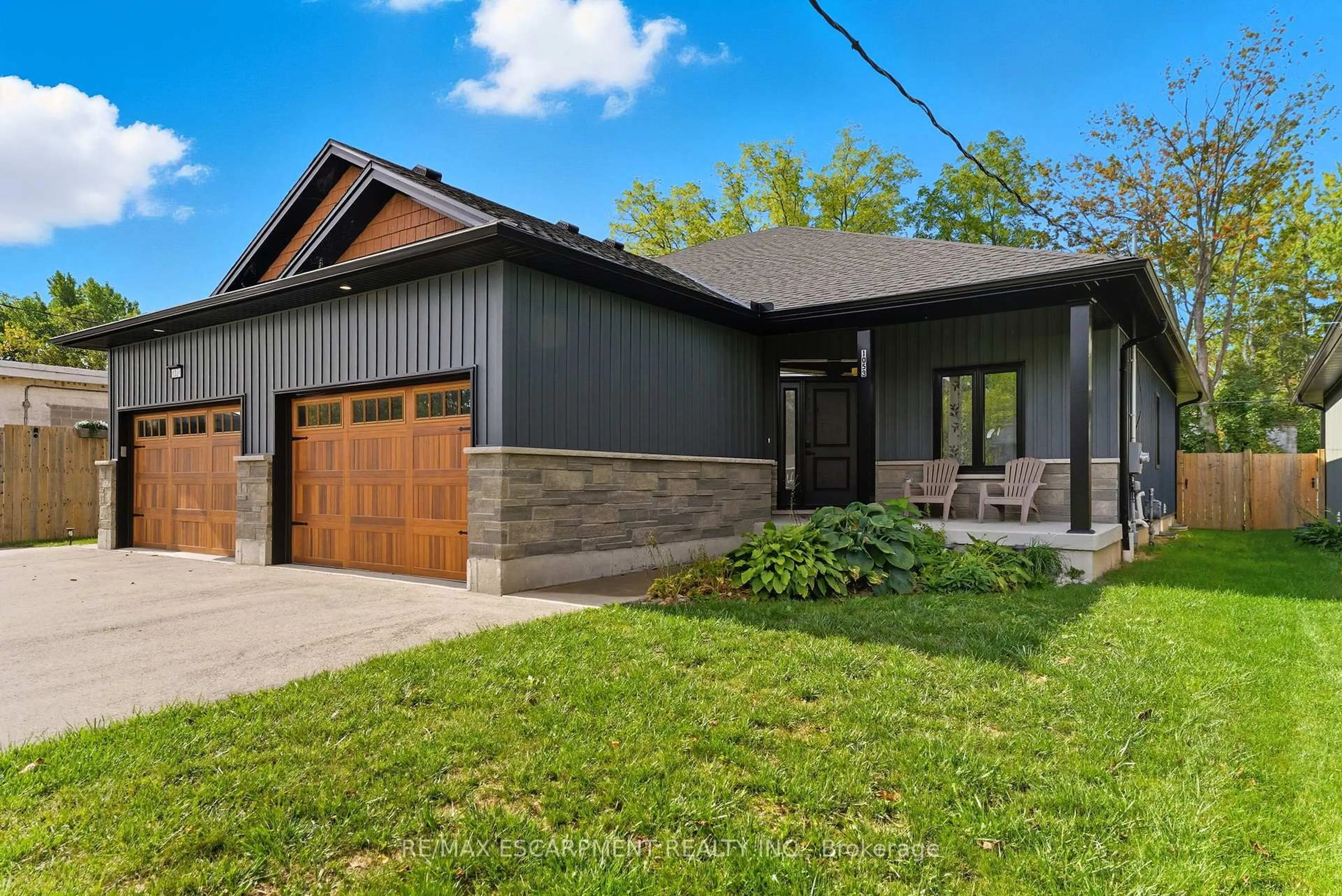Home with brick exterior material, street for 1053 Bay St, Norfolk Ontario N0E 1M0