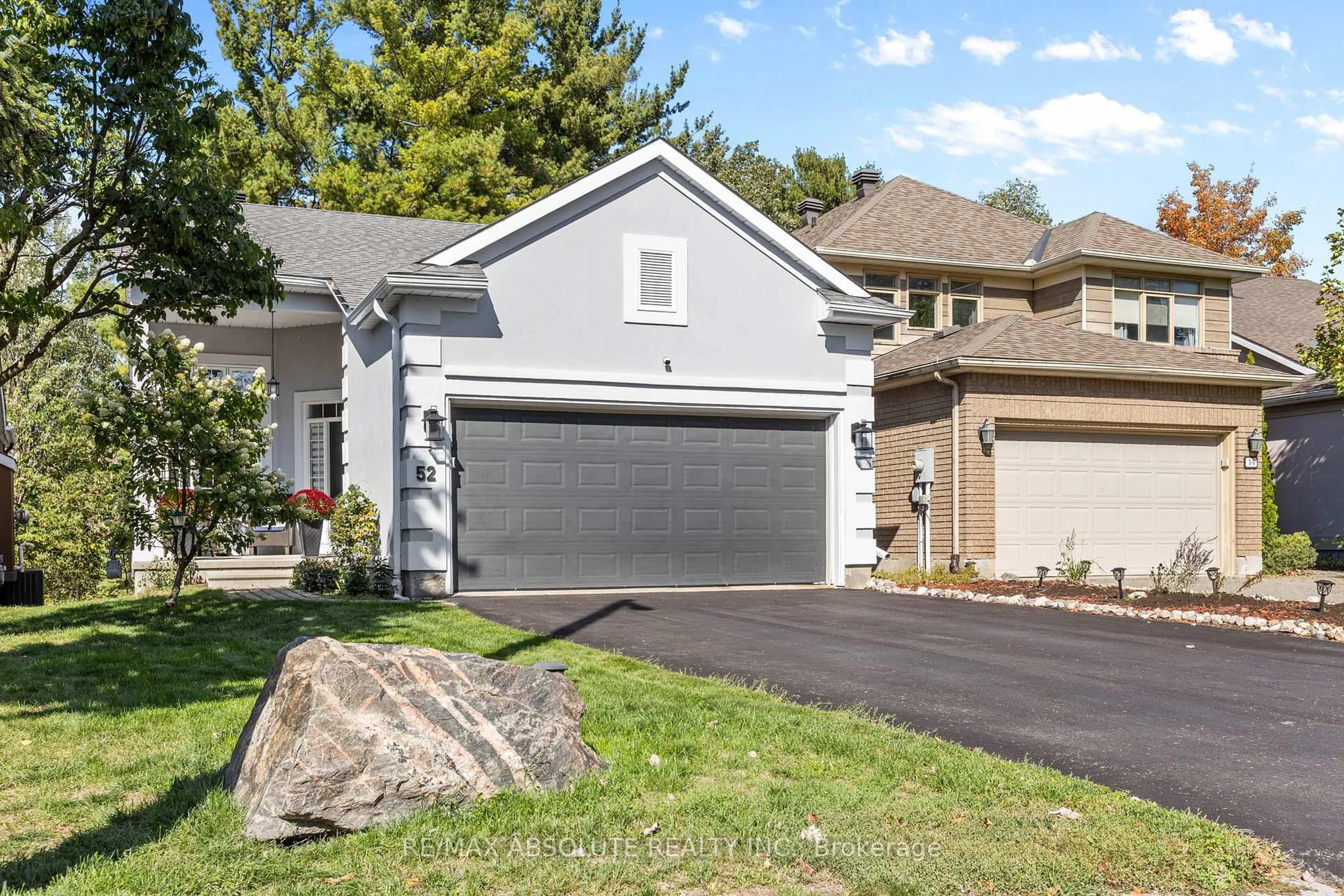 Home with vinyl exterior material, street for 52 Stonecroft Terr, Ottawa Ontario K2K 2T9