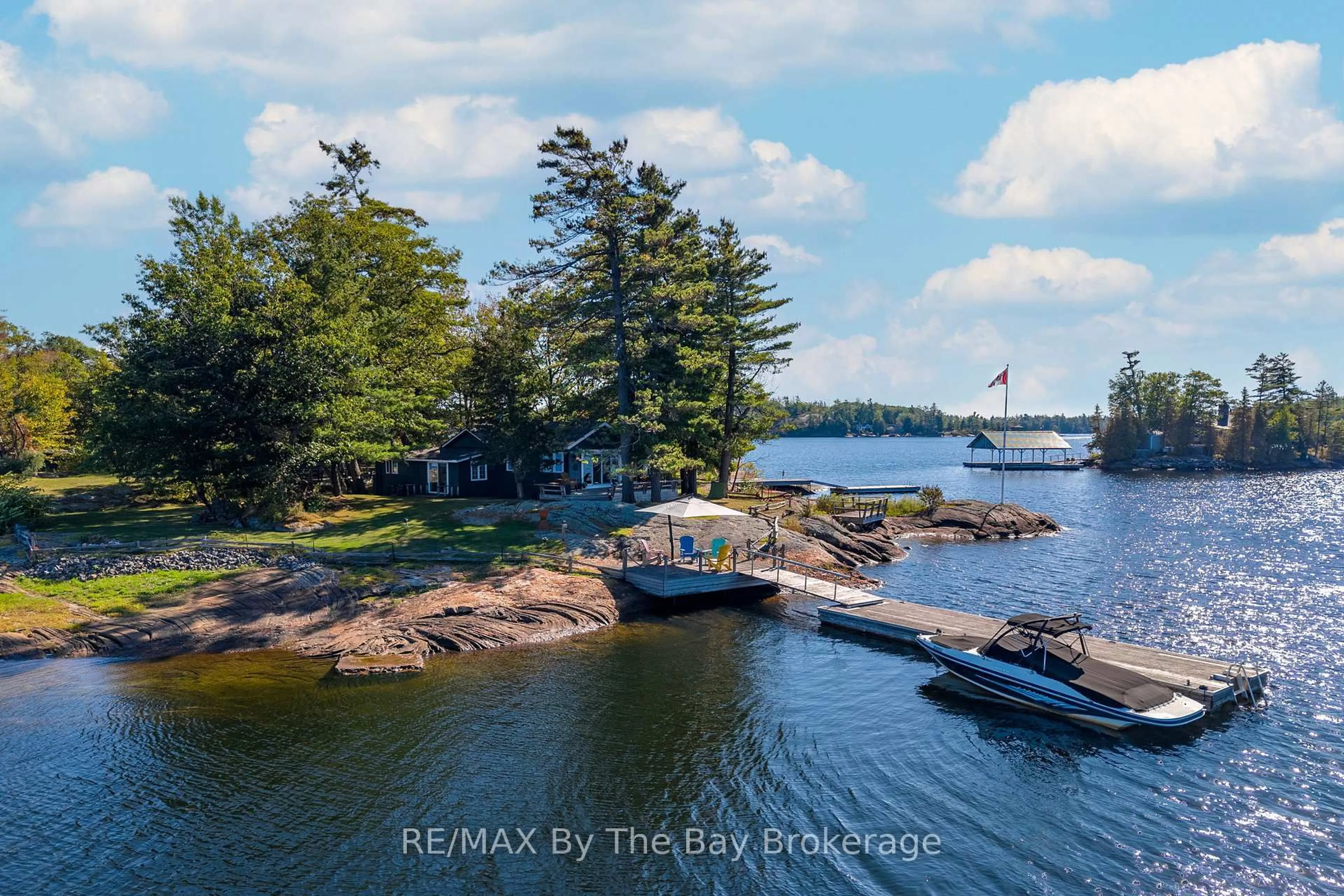 A pic from outside/outdoor area/front of a property/back of a property/a pic from drone, water/lake/river/ocean view for 2 Island 930, Georgian Bay Ontario P0E 1E0