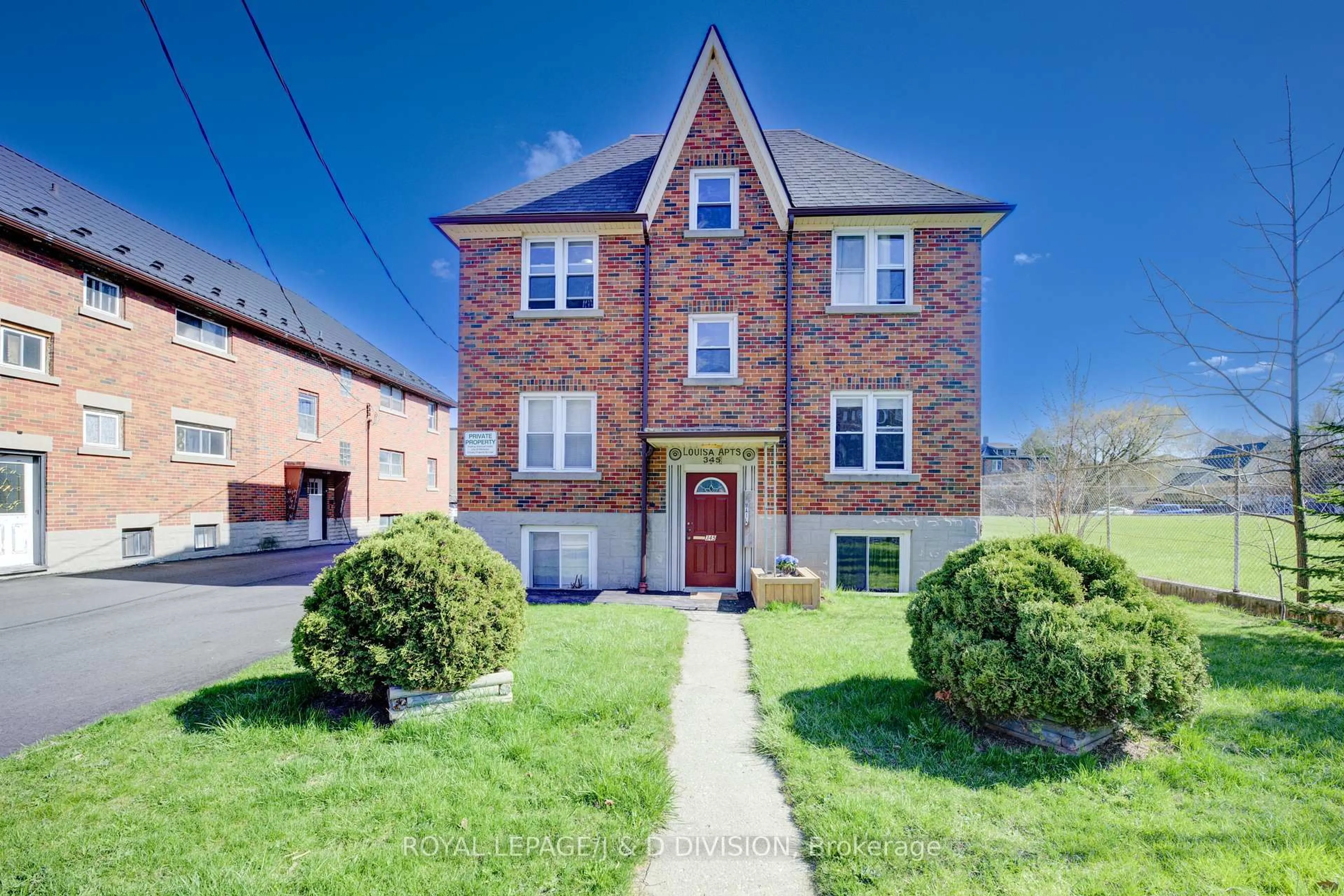 Home with brick exterior material, street for 345 Louisa St, Kitchener Ontario N2H 5N1