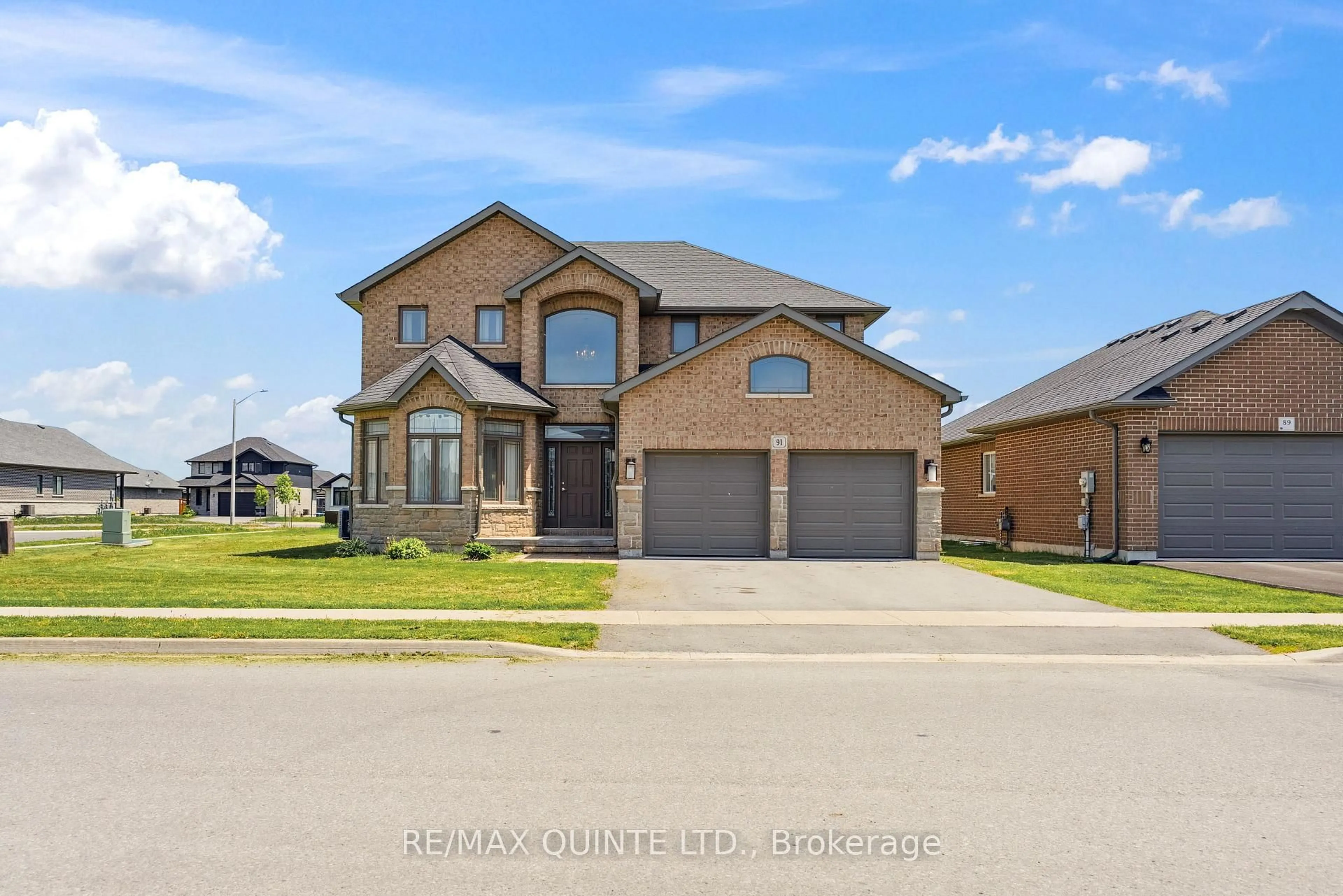 Home with brick exterior material, street for 91 Hampton Ridge Dr, Belleville Ontario K8N 0E6