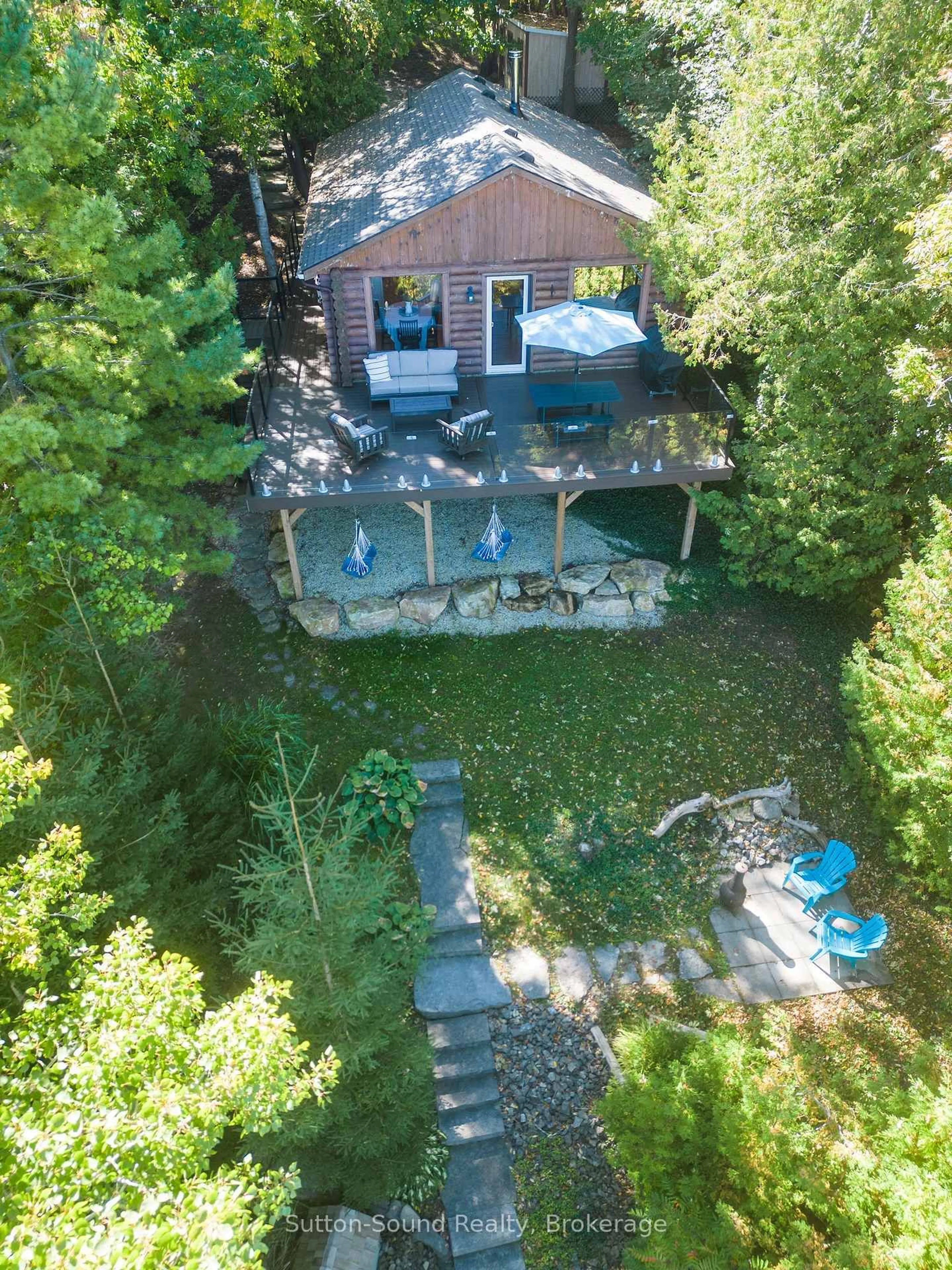 A pic from outside/outdoor area/front of a property/back of a property/a pic from drone, water/lake/river/ocean view for 103 Ivy Dr, Georgian Bluffs Ontario N0H 2T0