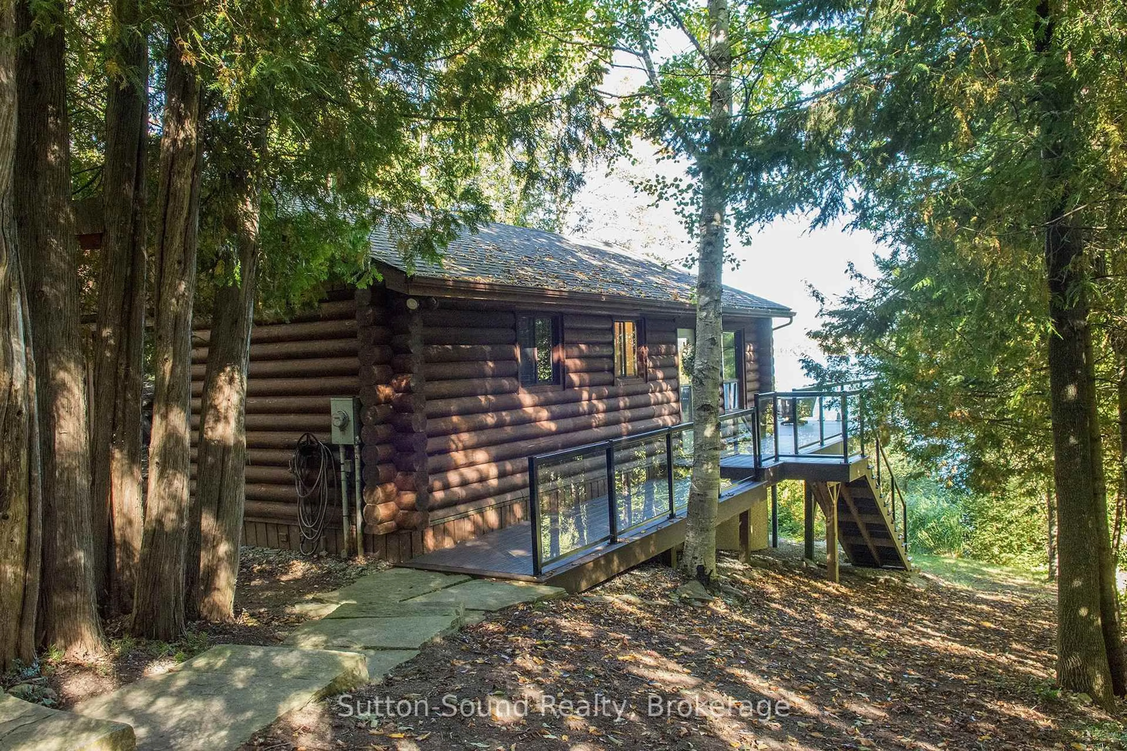 A pic from outside/outdoor area/front of a property/back of a property/a pic from drone, water/lake/river/ocean view for 103 Ivy Dr, Georgian Bluffs Ontario N0H 2T0