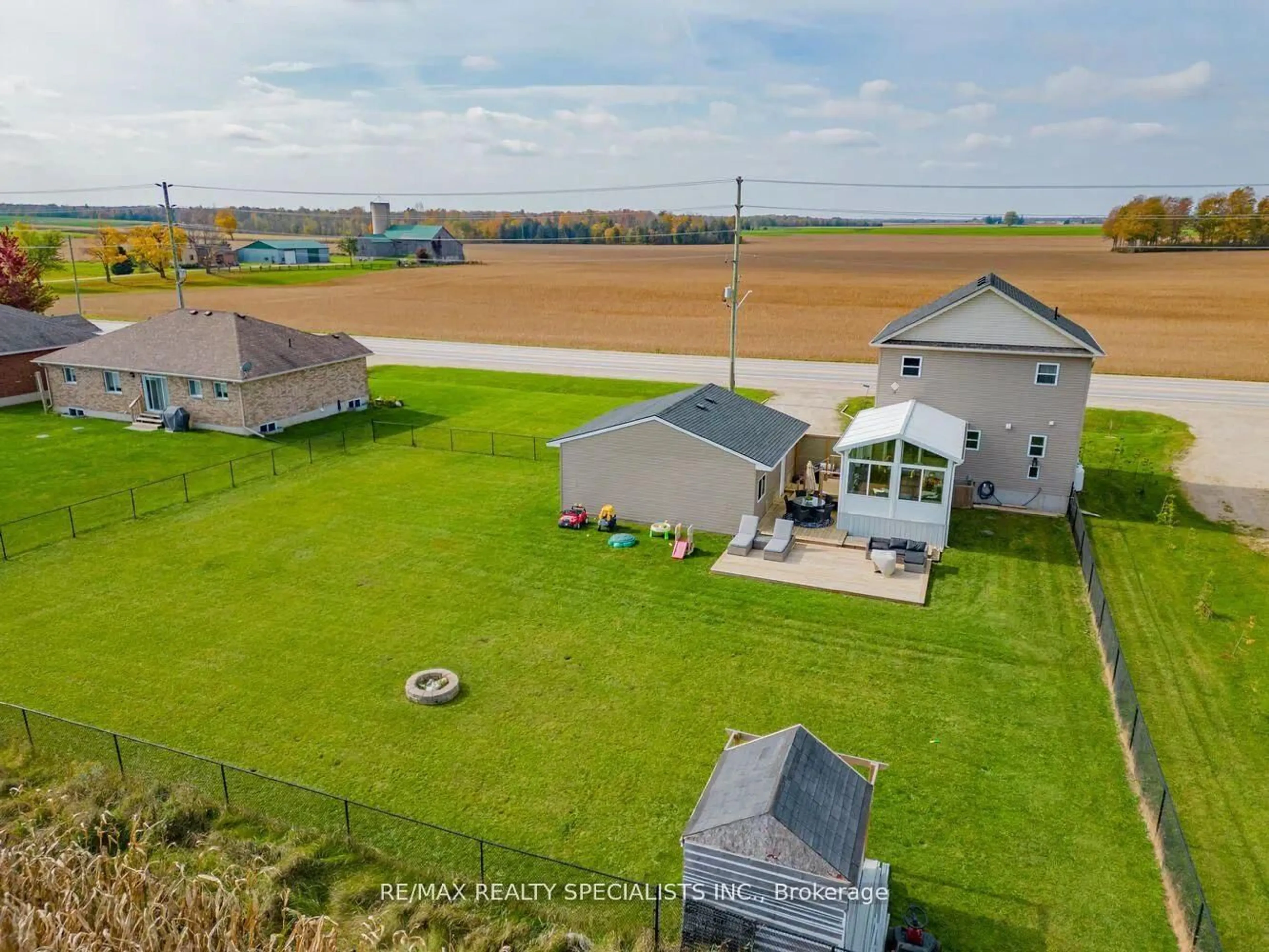 A pic from outside/outdoor area/front of a property/back of a property/a pic from drone, water/lake/river/ocean view for 1076 Brussels Line, Howick Ontario N0G 2X0