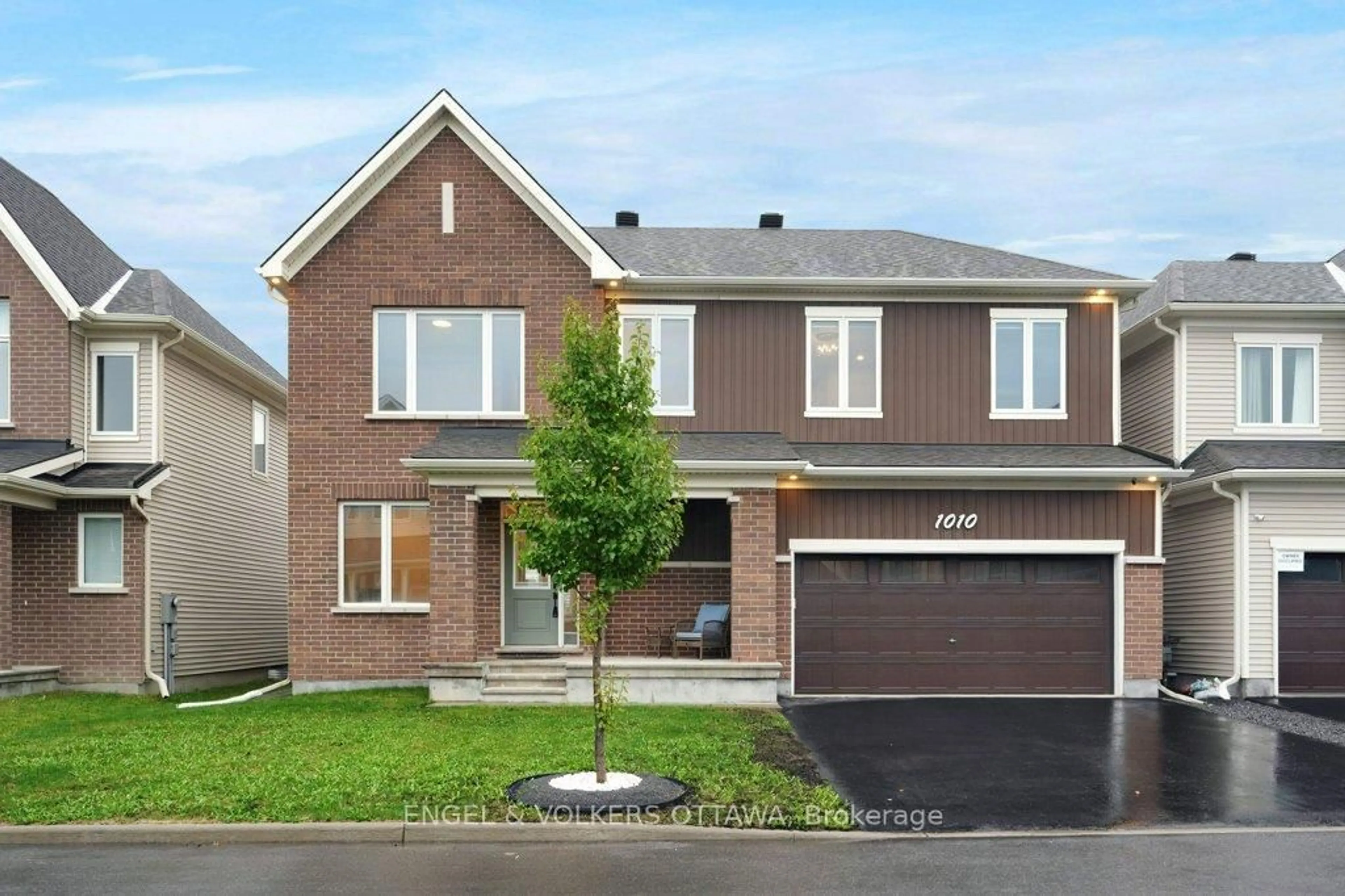 Home with brick exterior material, street for 1010 Carden Lane, Ottawa Ontario K1W 0N3