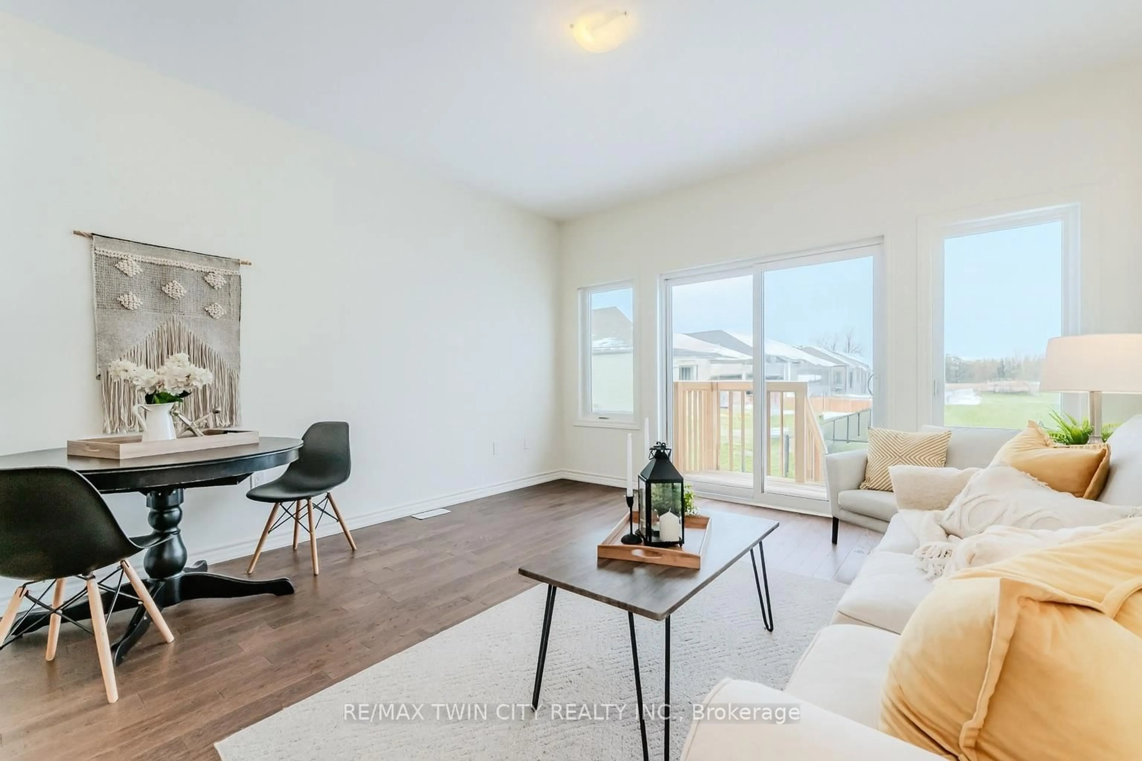 Living room with furniture, wood/laminate floor for 104 Cheryl Ave, North Perth Ontario N0G 1B0