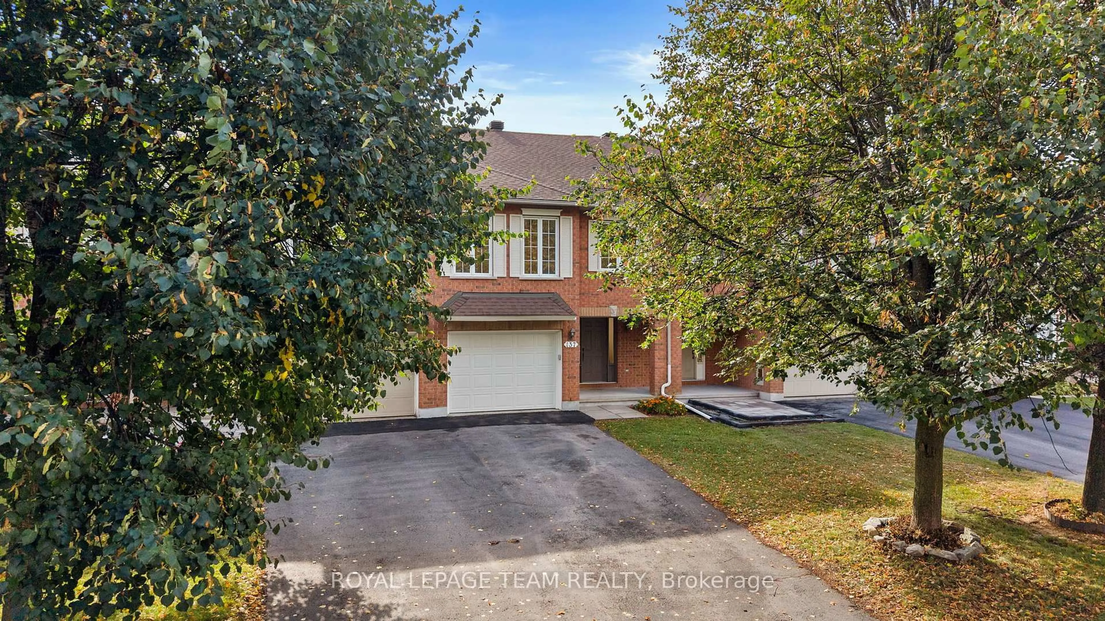 Home with brick exterior material, street for 137 Macassa Circ, Ottawa Ontario K2T 1J9