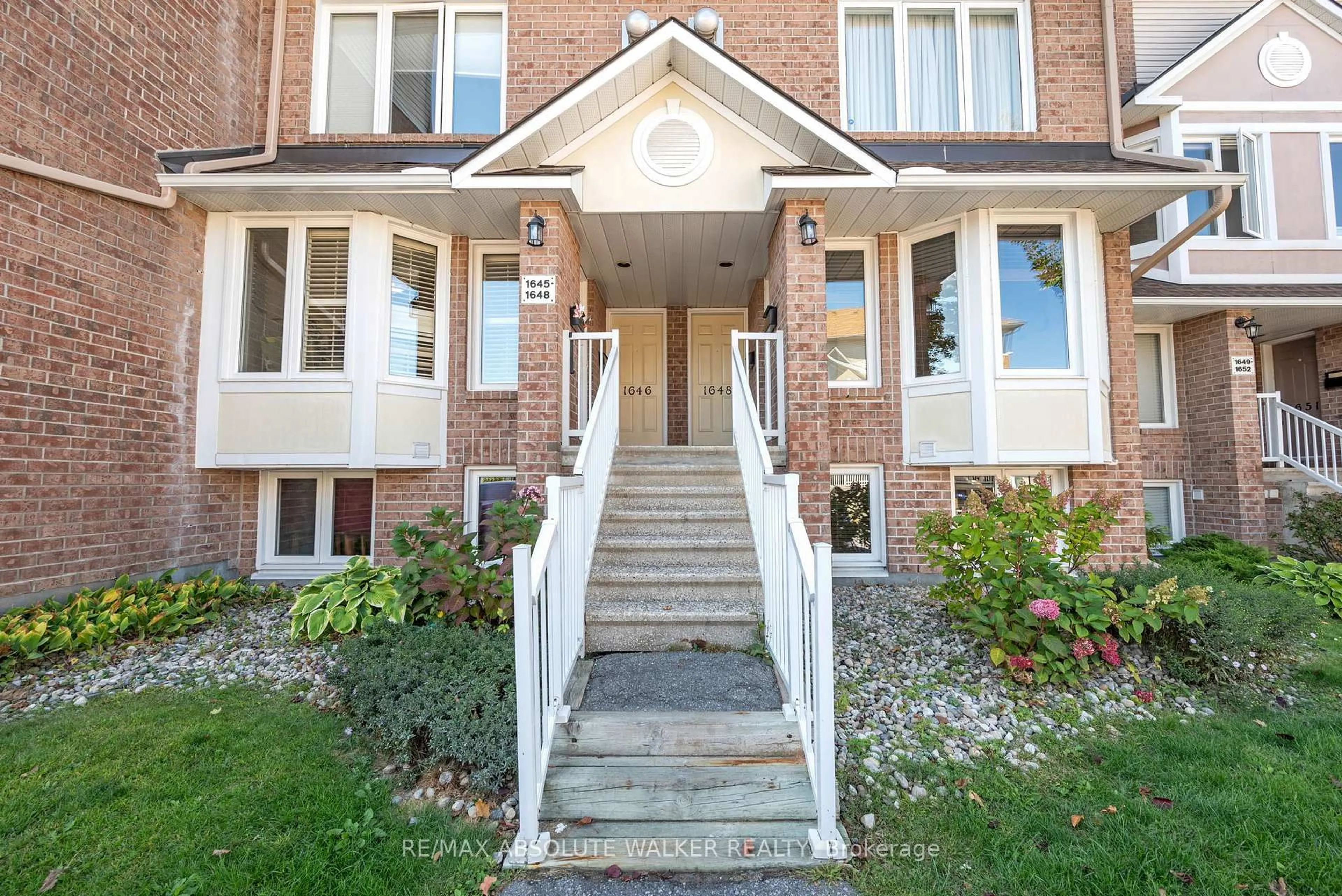 Home with brick exterior material, street for 1647 Locksley Lane, Ottawa Ontario K1J 1B6