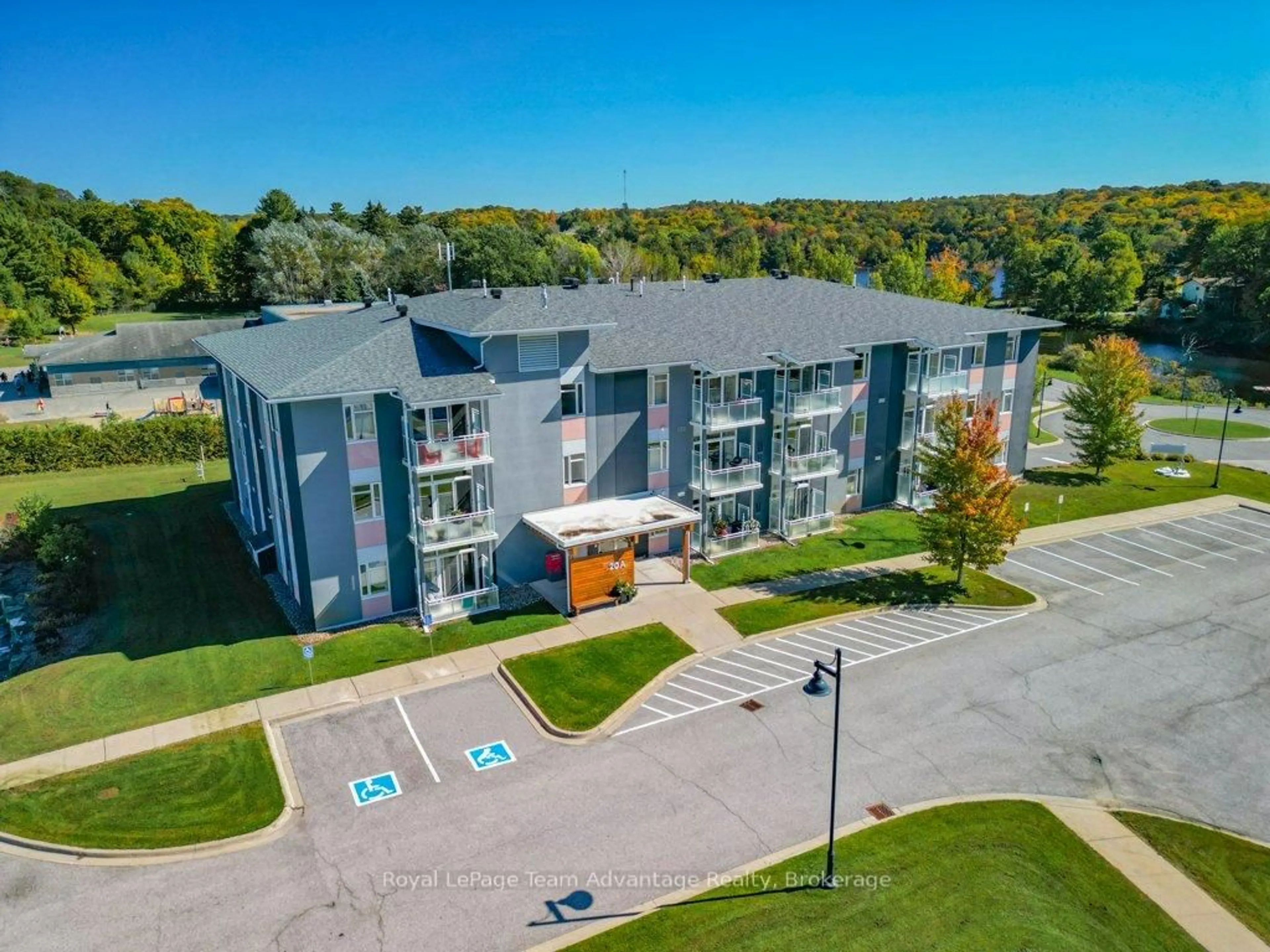 A pic from outside/outdoor area/front of a property/back of a property/a pic from drone, building for 20A Silver Birch Crt #203, Parry Sound Ontario P2A 0A7