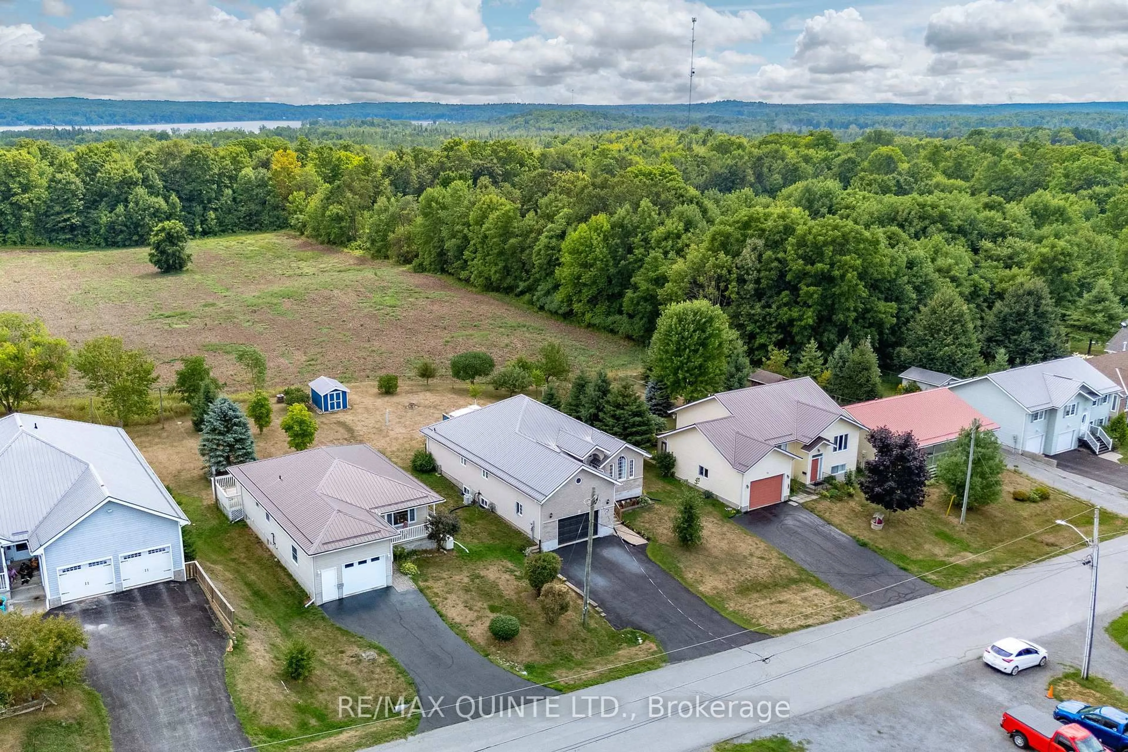 A pic from outside/outdoor area/front of a property/back of a property/a pic from drone, water/lake/river/ocean view for 99 Mckenzie St, Madoc Ontario K0K 2K0