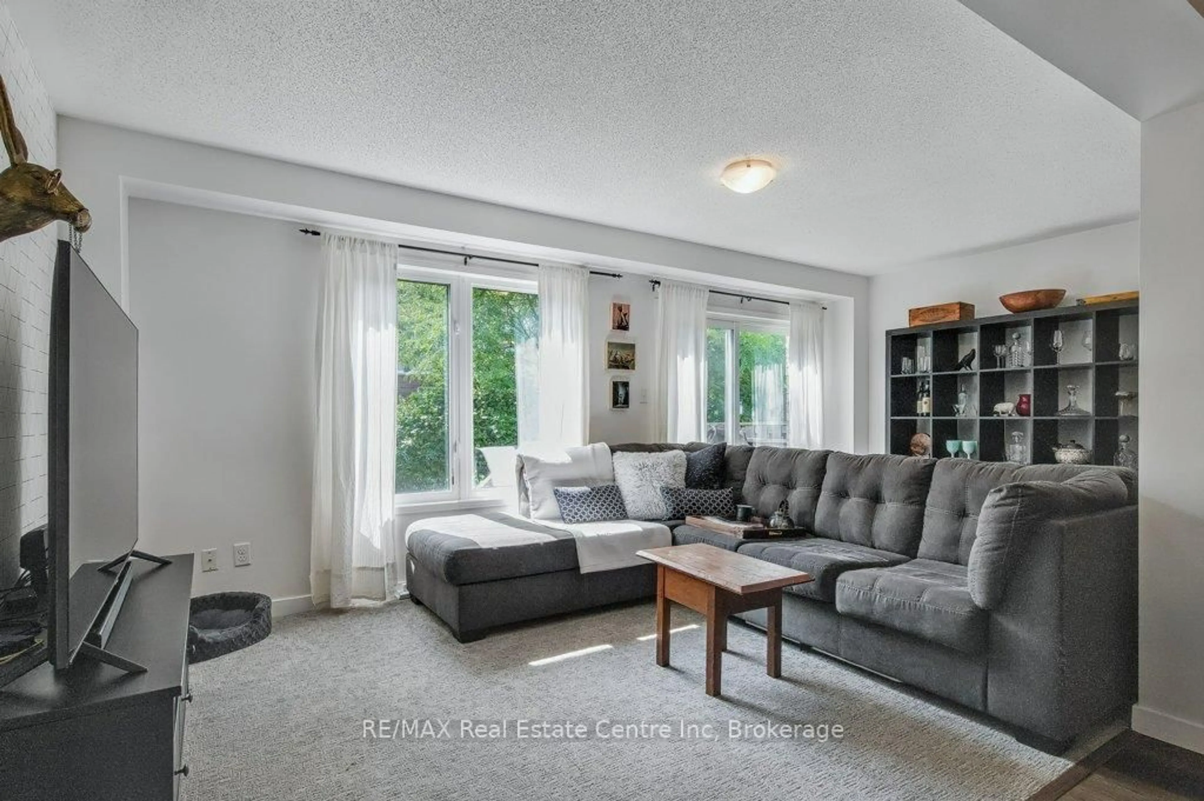 Living room with furniture, unknown for 1035 Victoria Rd #59, Guelph Ontario N1L 1B3