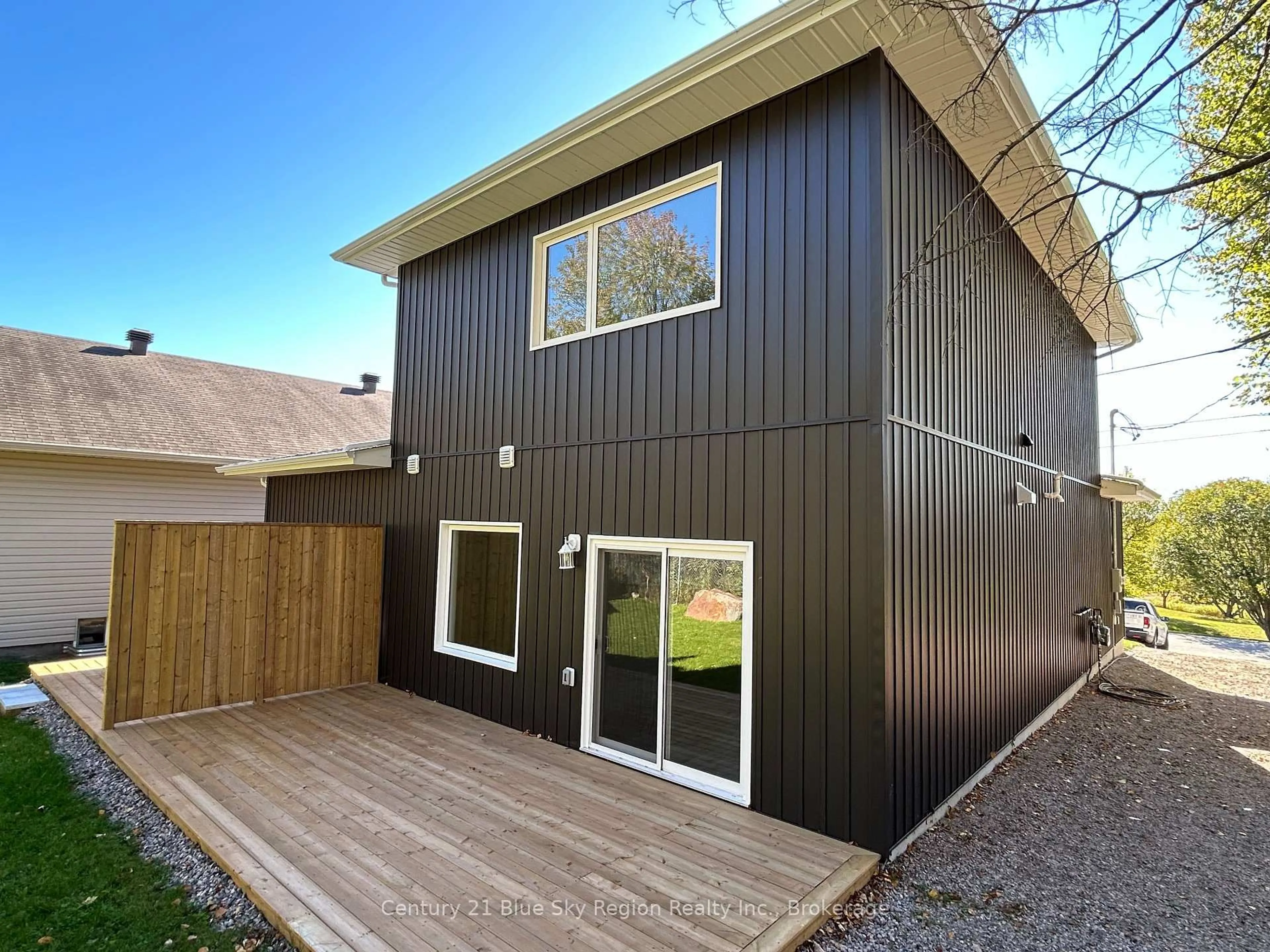 Home with vinyl exterior material, street for 16 Birch St, Powassan Ontario P0H 1Z0
