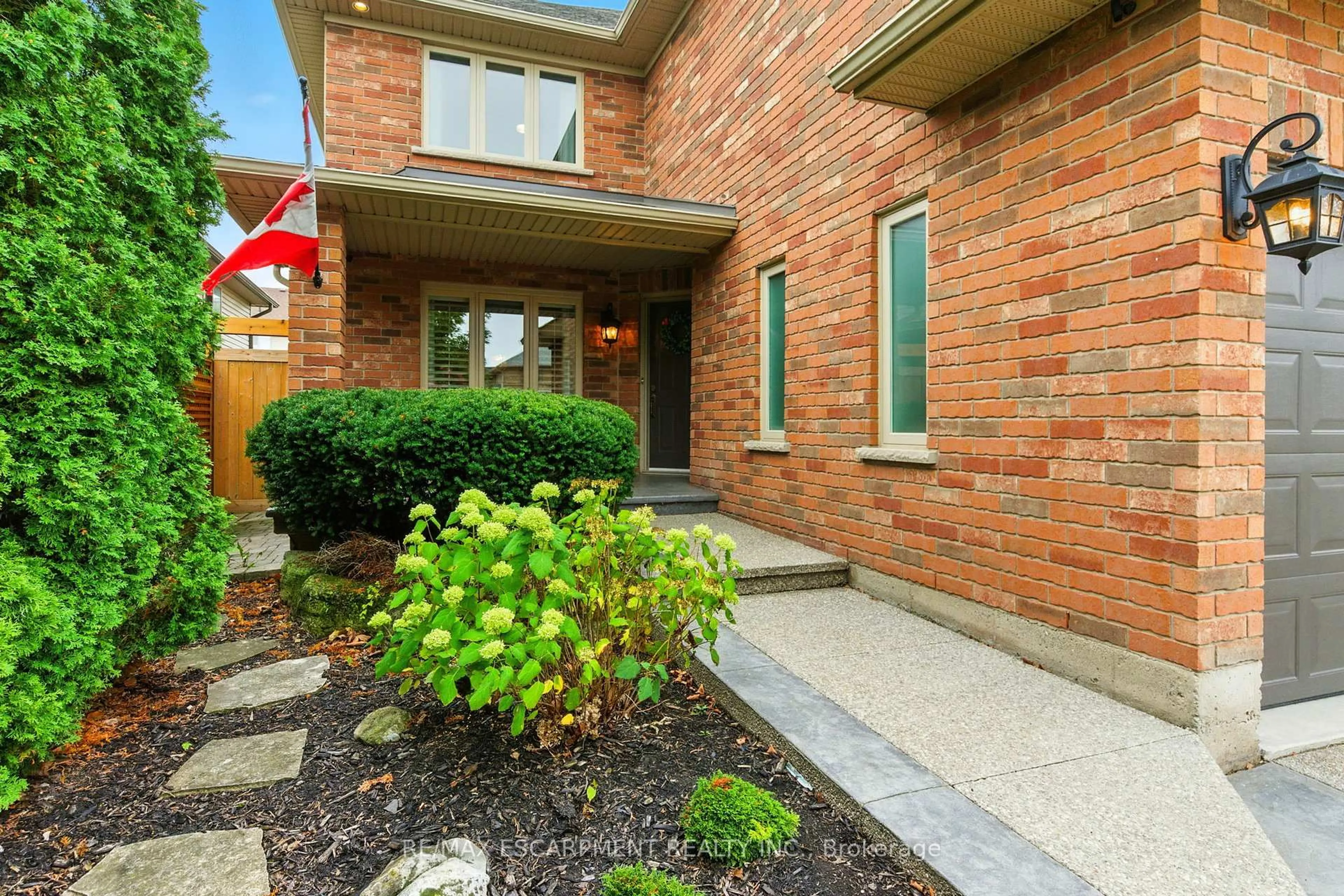 Home with brick exterior material, street for 56 Sonoma Lane, Hamilton Ontario L8E 6B6
