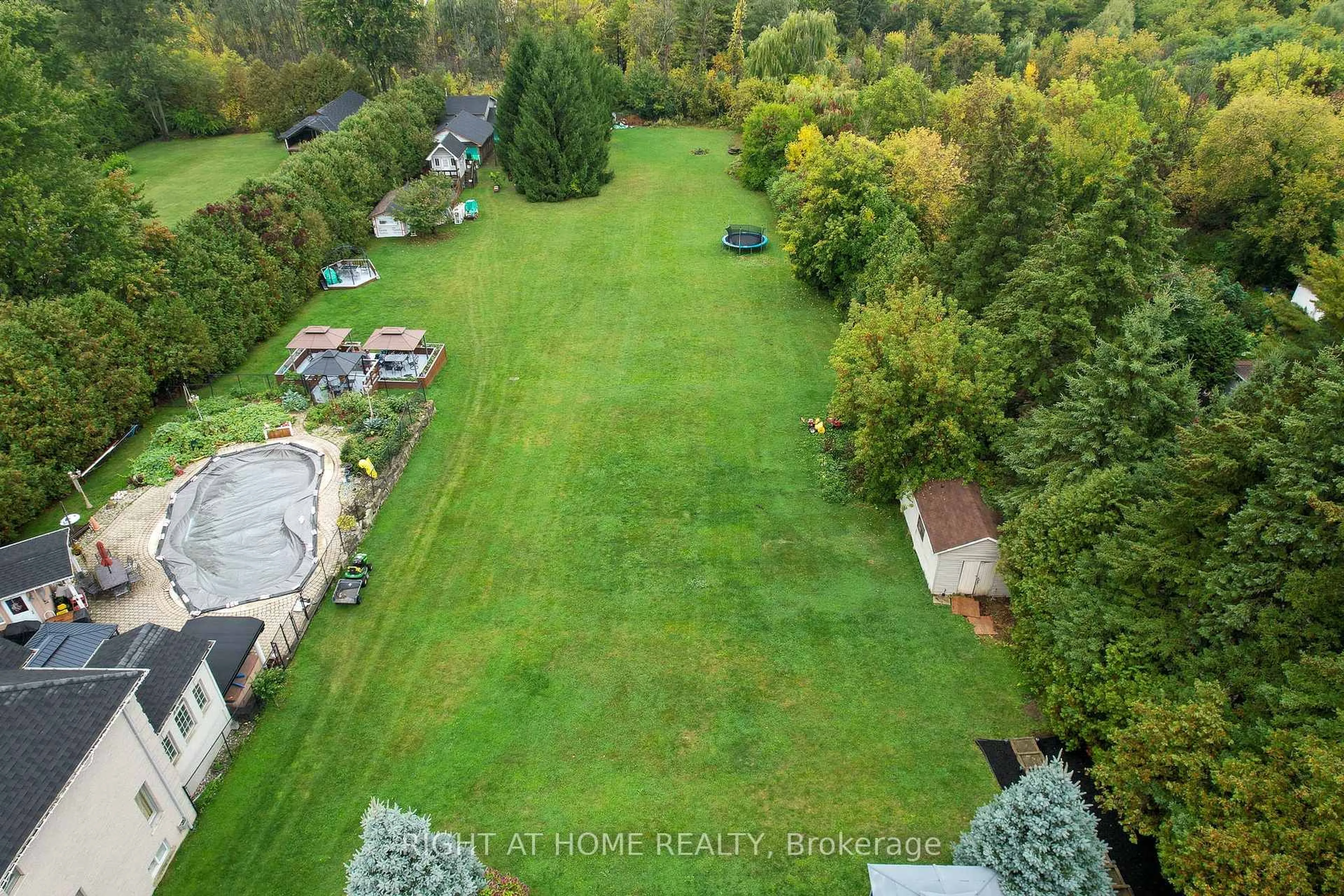 A pic from outside/outdoor area/front of a property/back of a property/a pic from drone, forest/trees view for 435 Parkside Dr, Hamilton Ontario L8B 0Y6