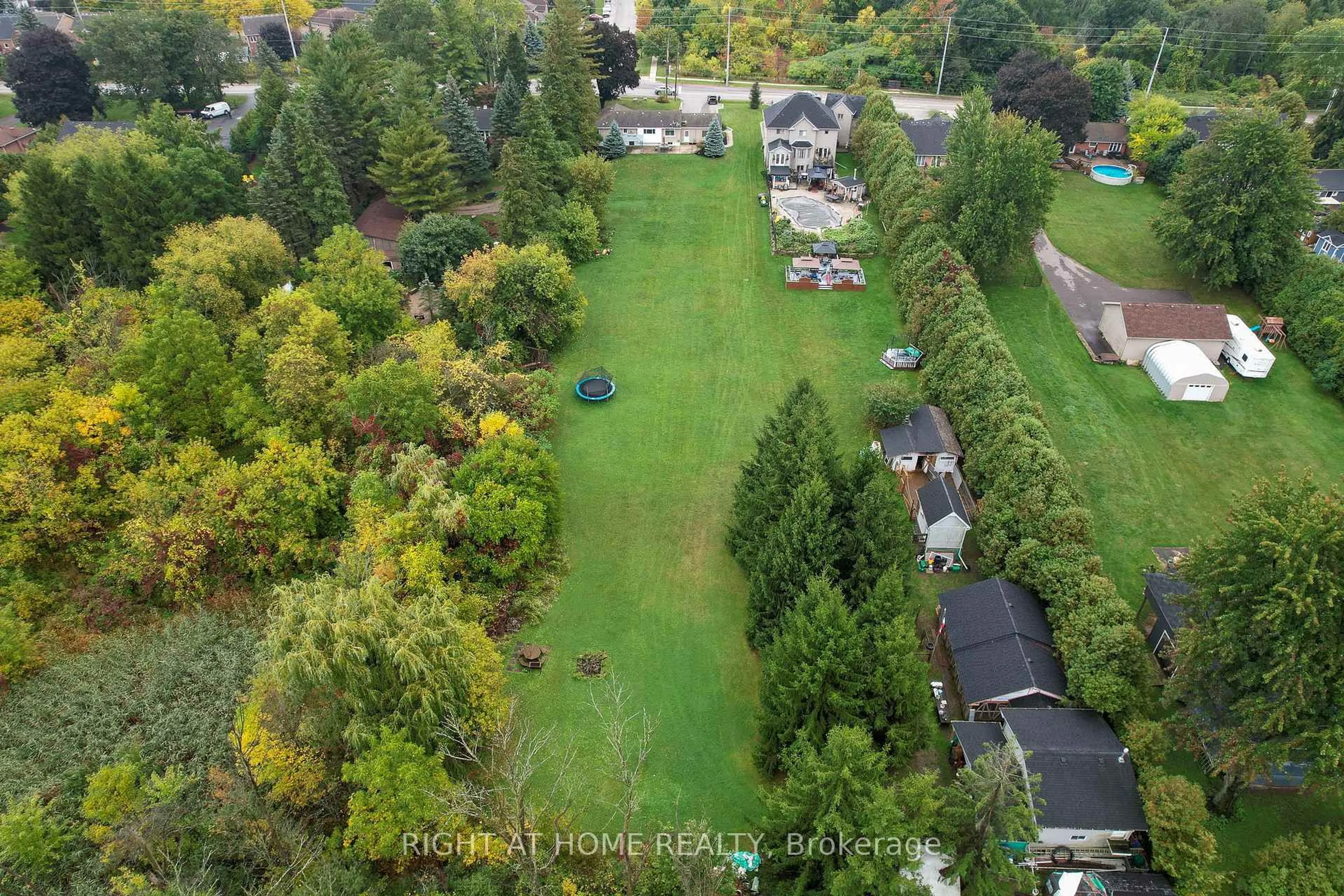 A pic from outside/outdoor area/front of a property/back of a property/a pic from drone, forest/trees view for 435 Parkside Dr, Hamilton Ontario L8B 0Y6