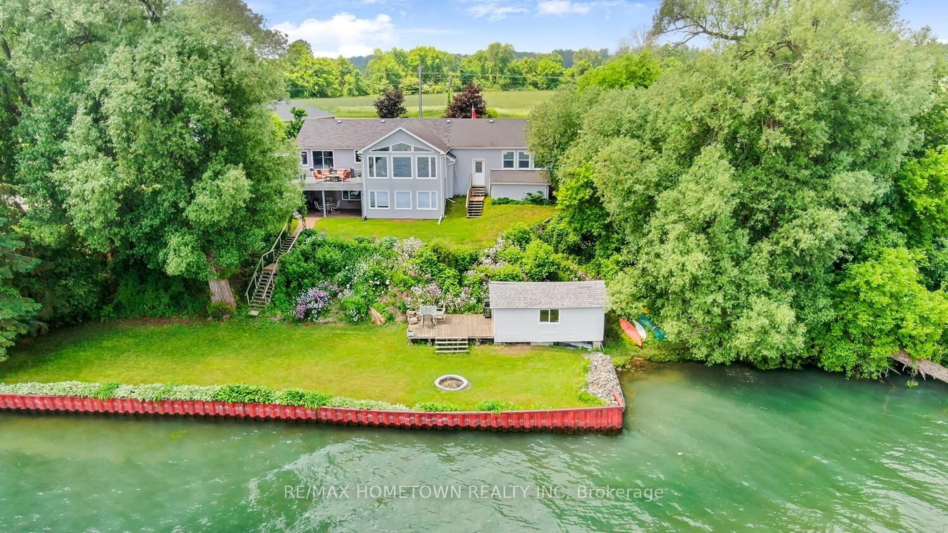 A pic from outside/outdoor area/front of a property/back of a property/a pic from drone, water/lake/river/ocean view for 1435 County Road 2 Rd, Augusta Ontario K0E 1T0