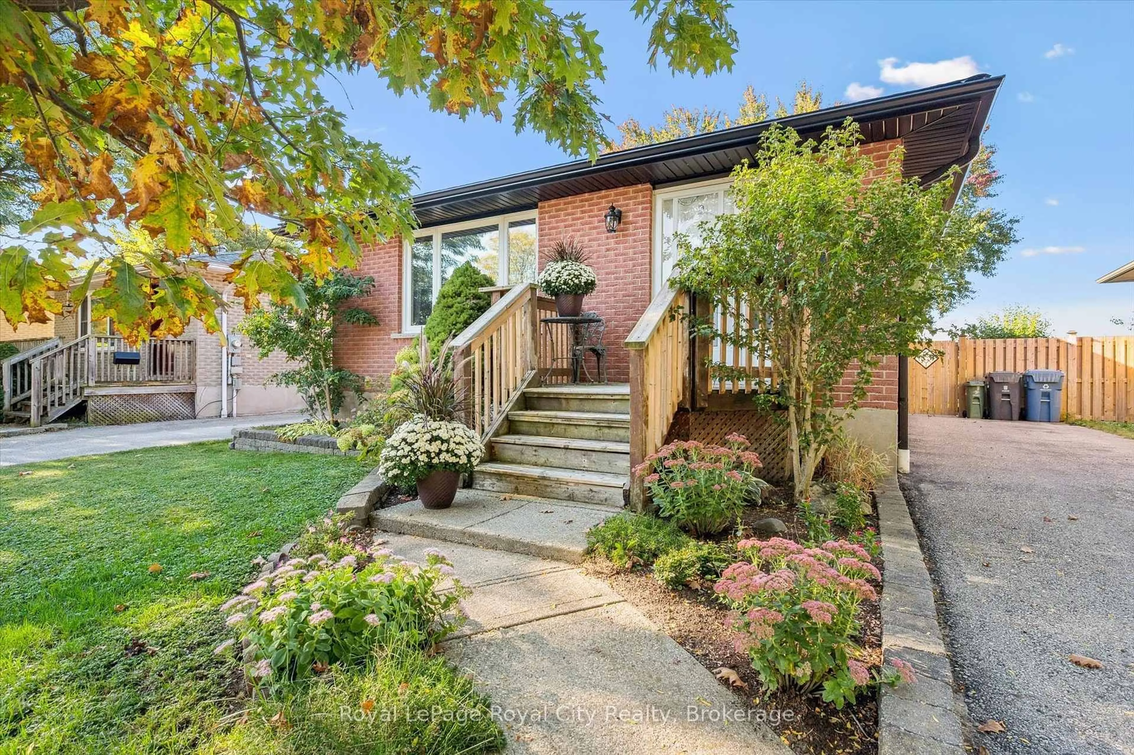 Home with brick exterior material, street for 165 Hadati Rd, Guelph Ontario N1E 6N3