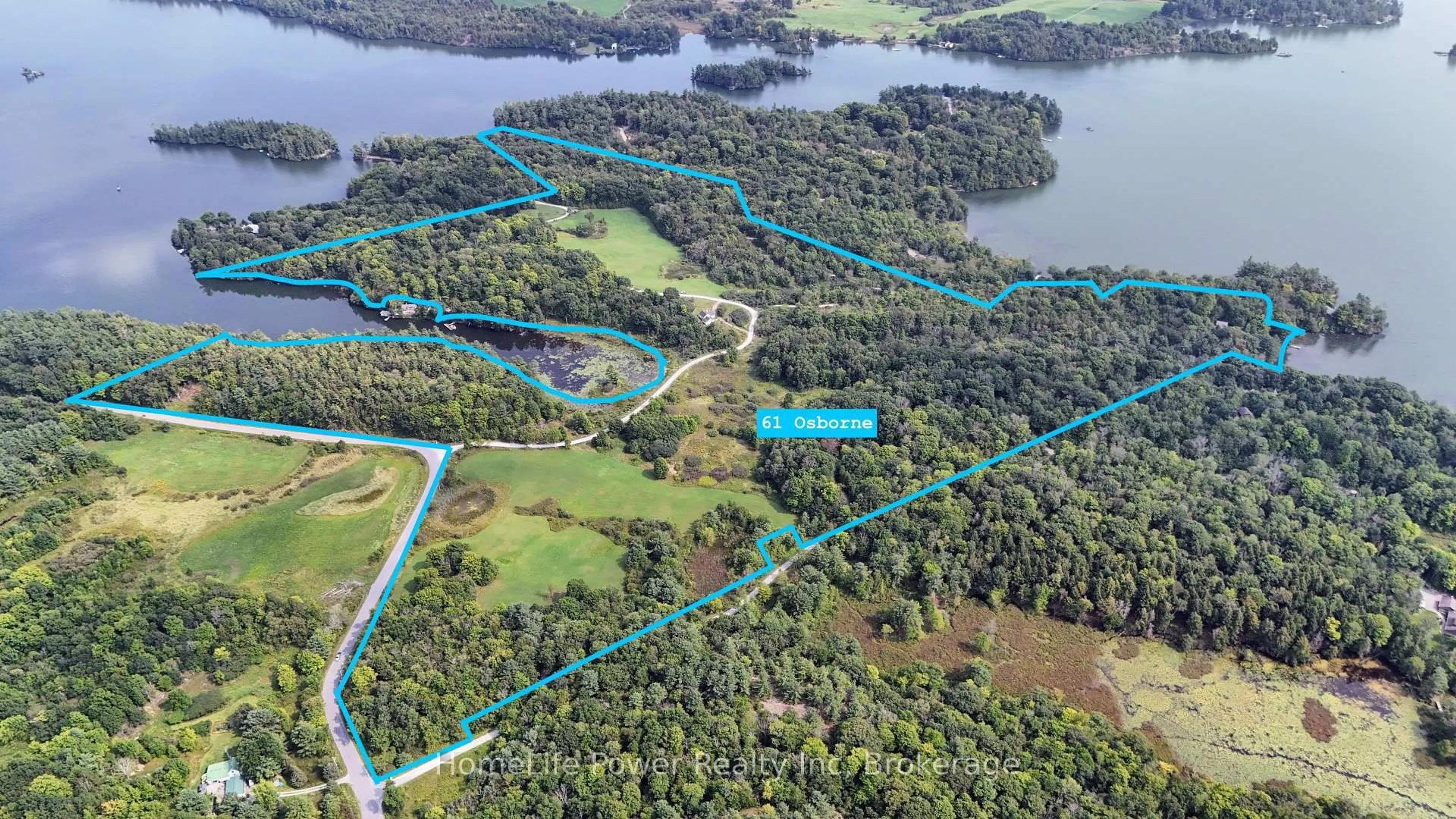 A pic from outside/outdoor area/front of a property/back of a property/a pic from drone, water/lake/river/ocean view for 61 Osborne Lane, Battersea Ontario K0H 1H0