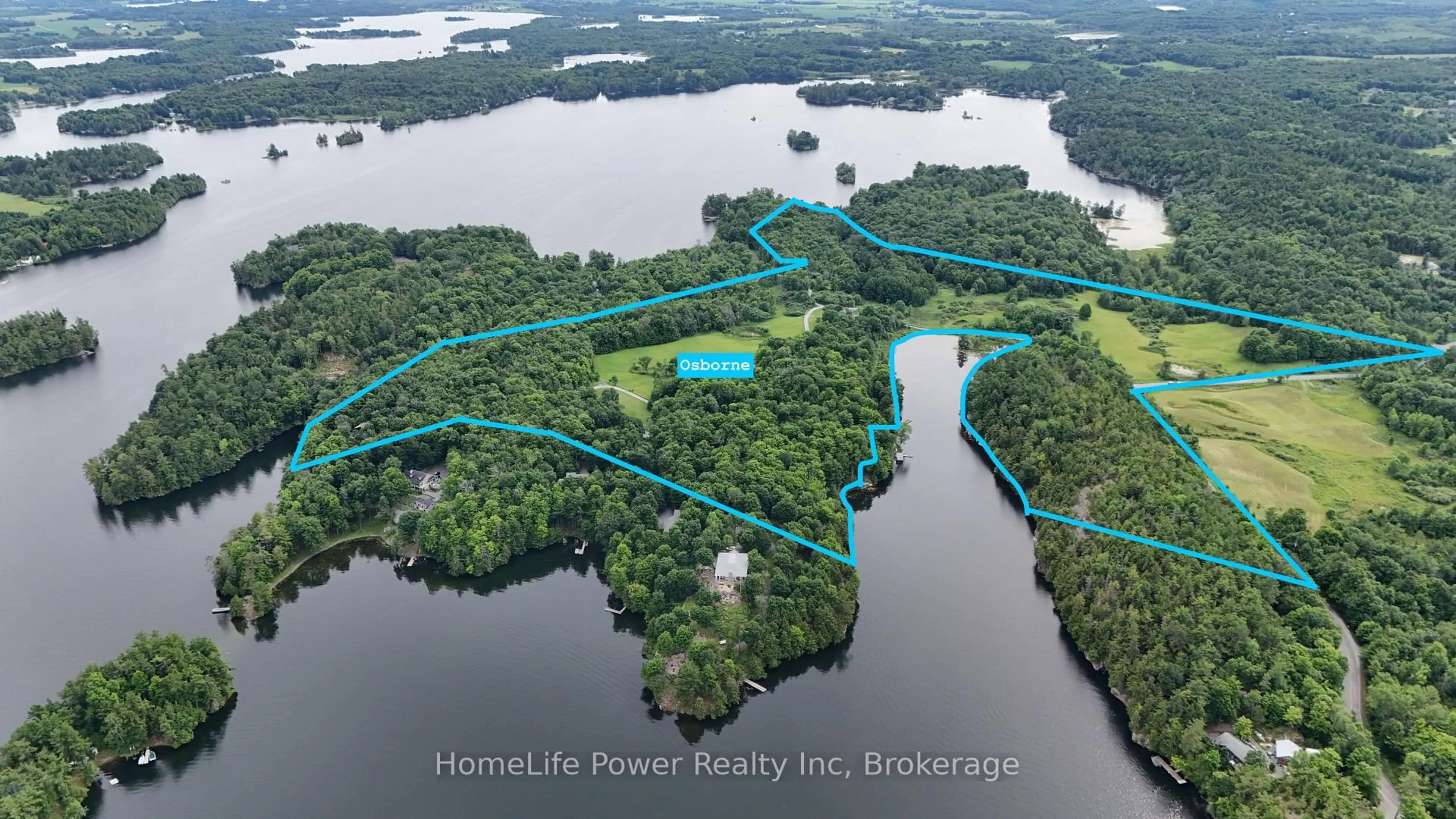 A pic from outside/outdoor area/front of a property/back of a property/a pic from drone, water/lake/river/ocean view for 61 Osborne Lane, Battersea Ontario K0H 1H0
