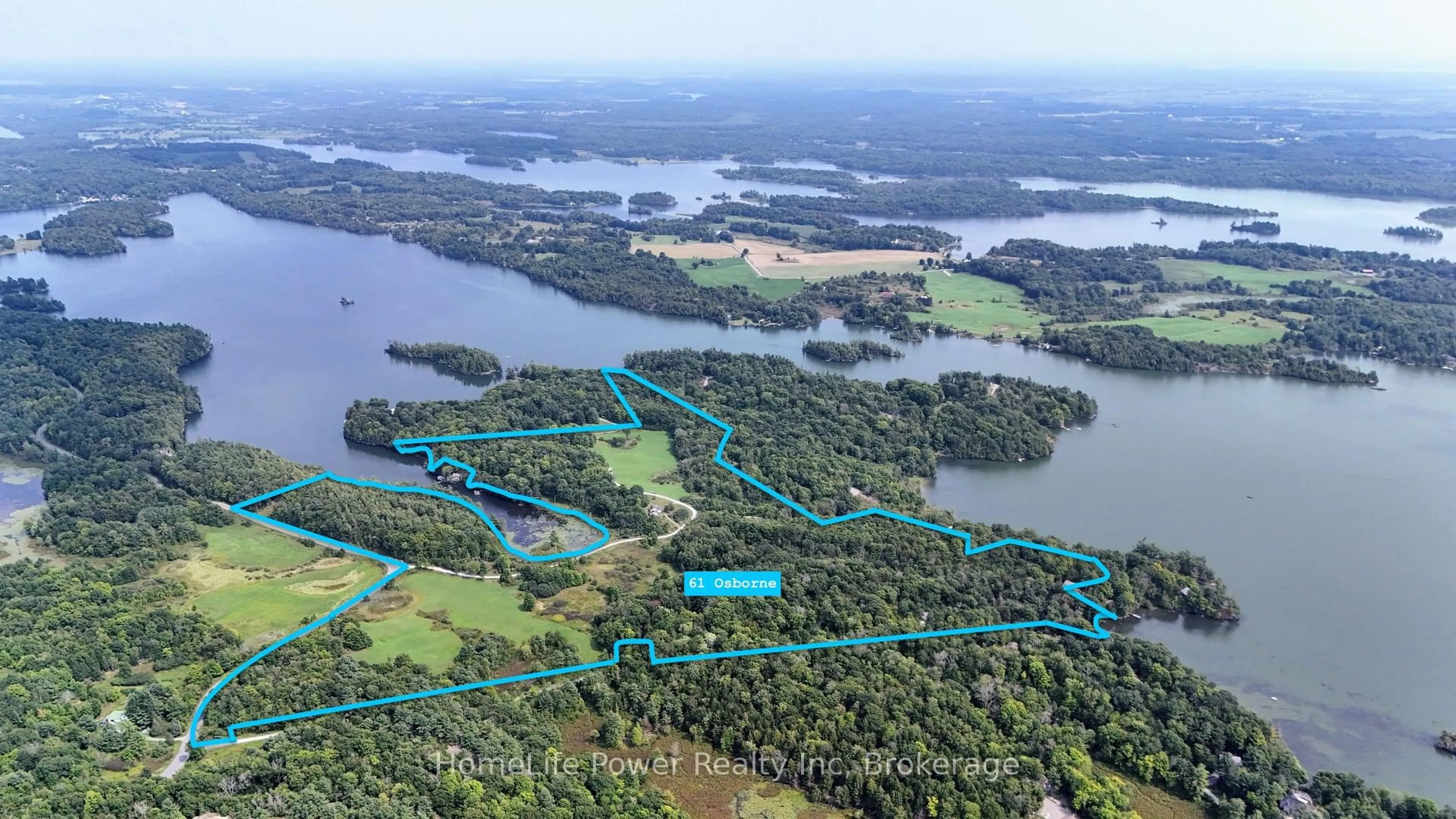 A pic from outside/outdoor area/front of a property/back of a property/a pic from drone, water/lake/river/ocean view for 61 Osborne Lane, Battersea Ontario K0H 1H0