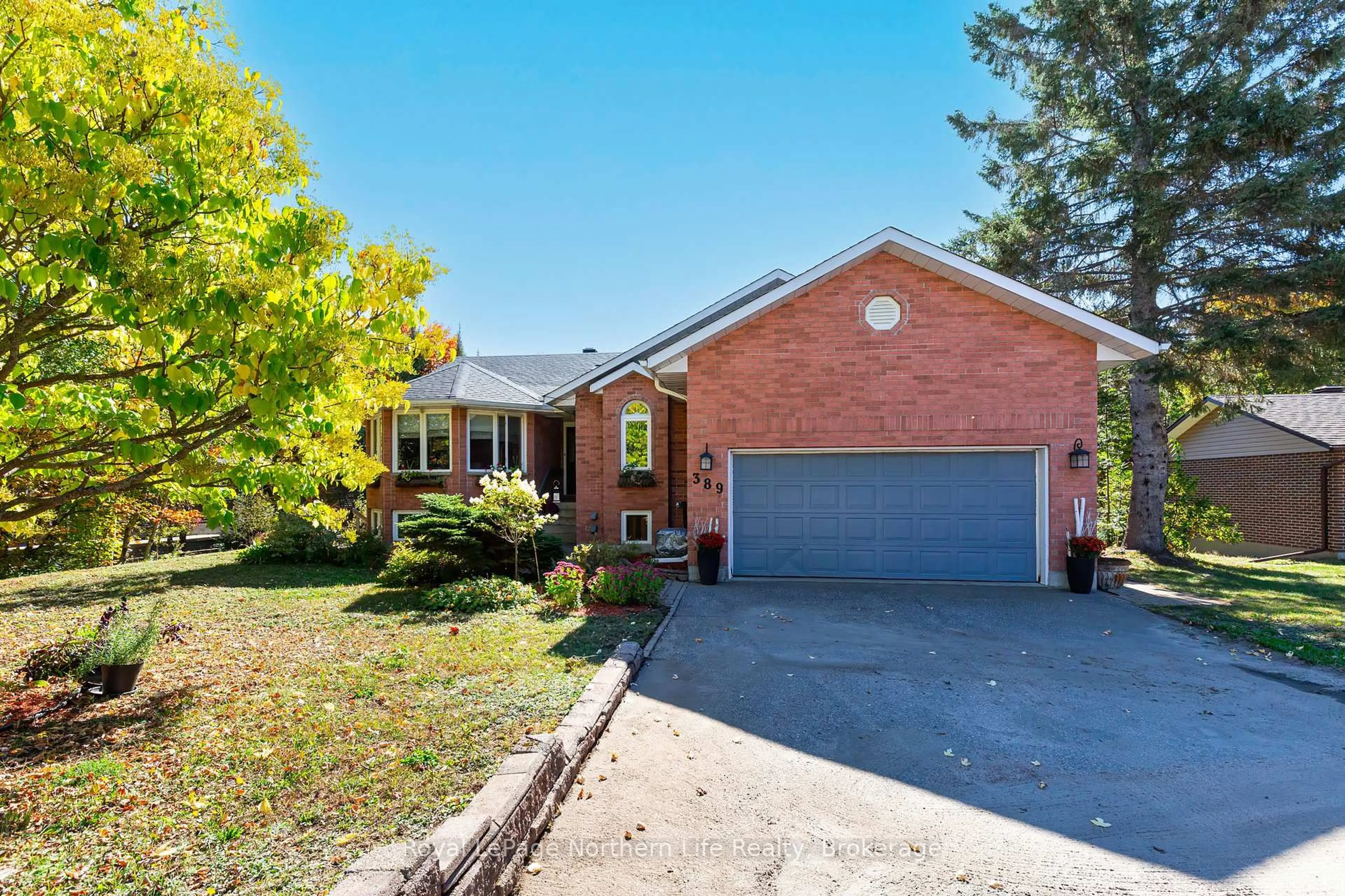 Home with brick exterior material, street for 389 Carmichael Dr, North Bay Ontario P1B 8G2