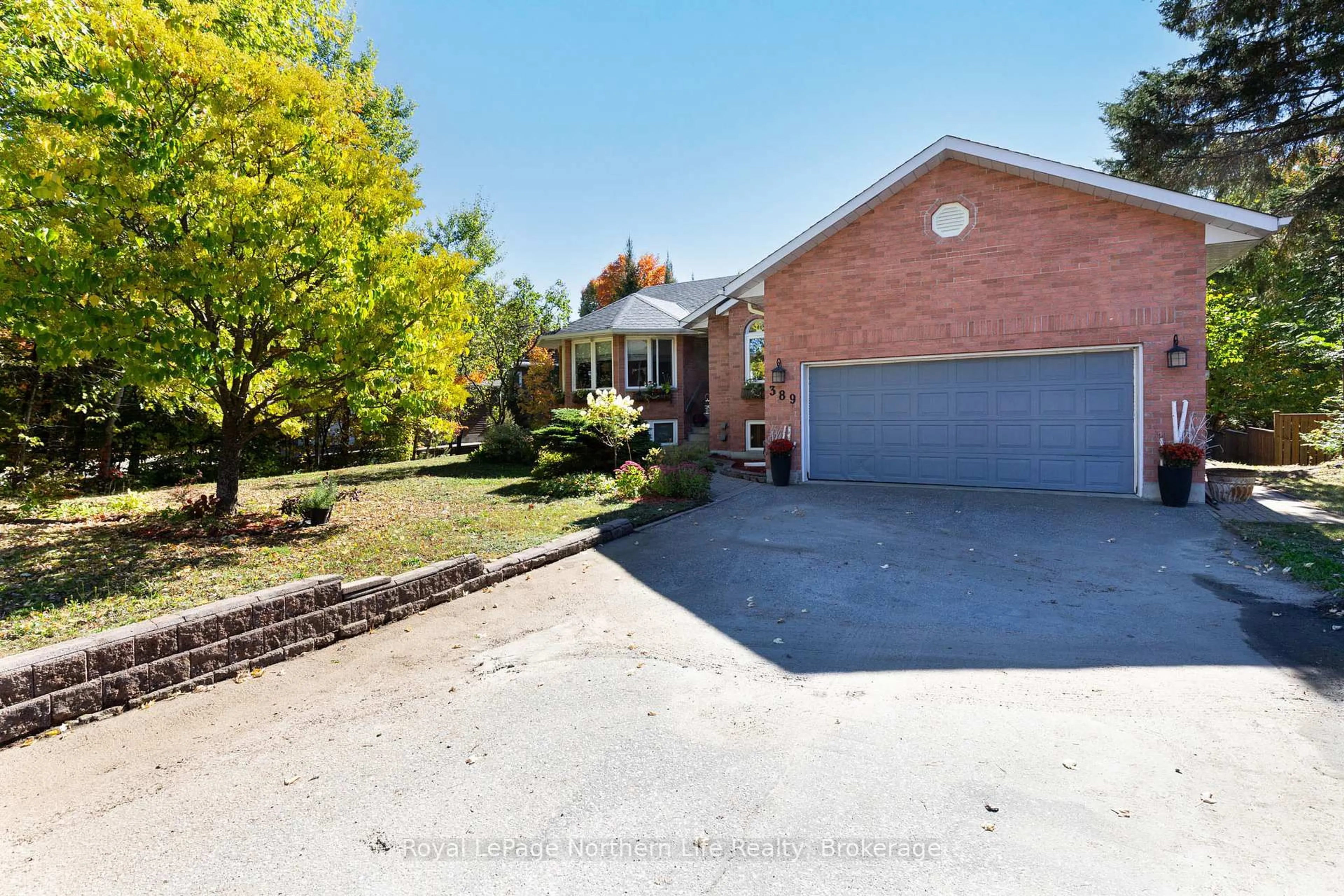 A pic from outside/outdoor area/front of a property/back of a property/a pic from drone, street for 389 Carmichael Dr, North Bay Ontario P1B 8G2