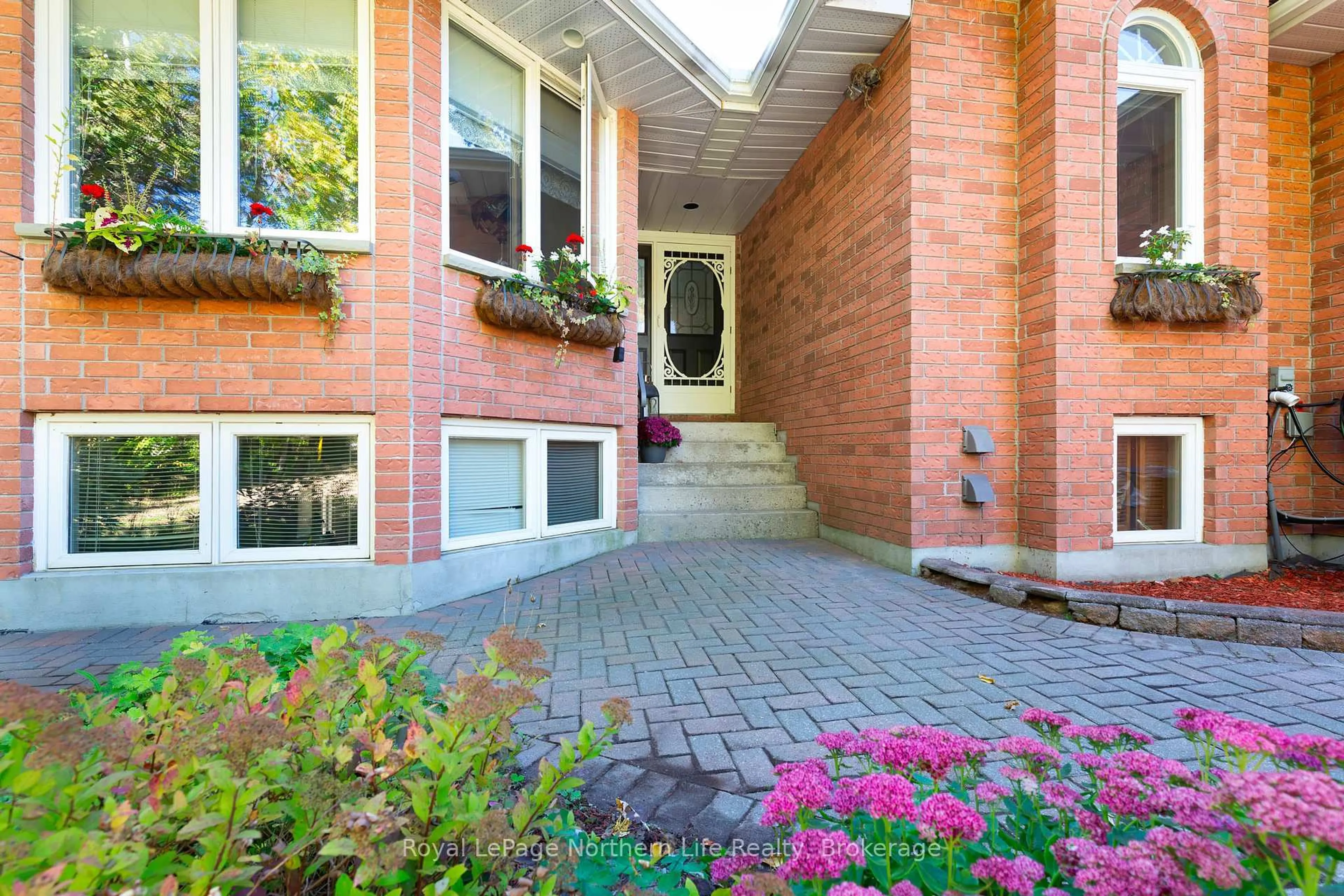 Home with brick exterior material, street for 389 Carmichael Dr, North Bay Ontario P1B 8G2