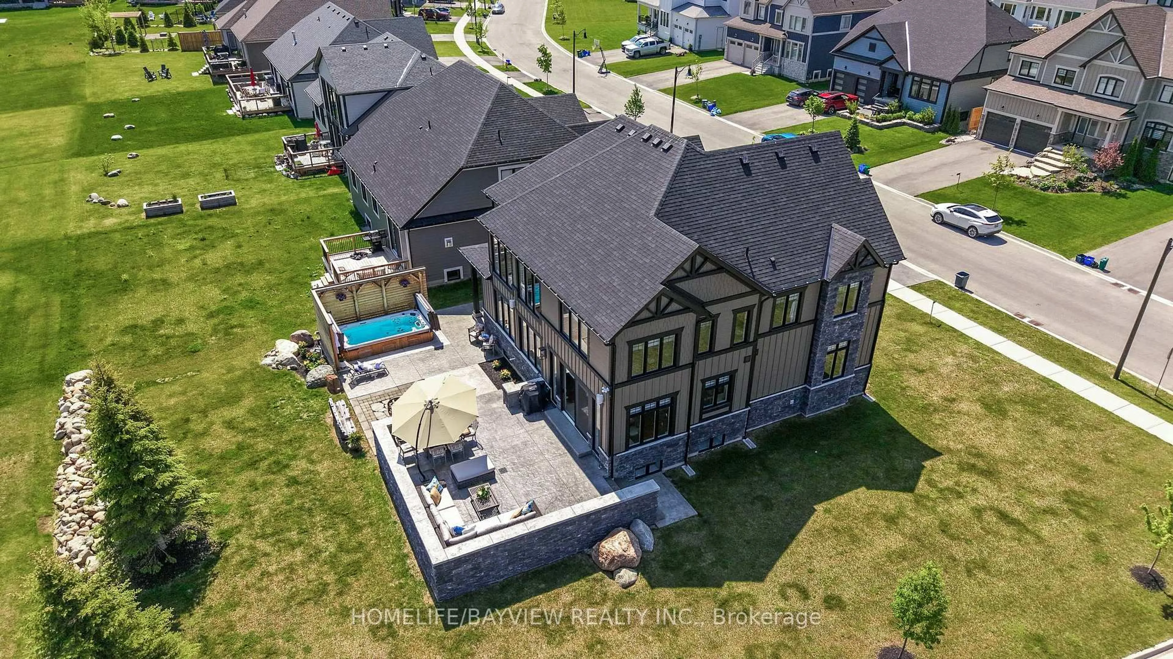 A pic from outside/outdoor area/front of a property/back of a property/a pic from drone, street for 100 Reed Way, Blue Mountains Ontario L9Y 4P5