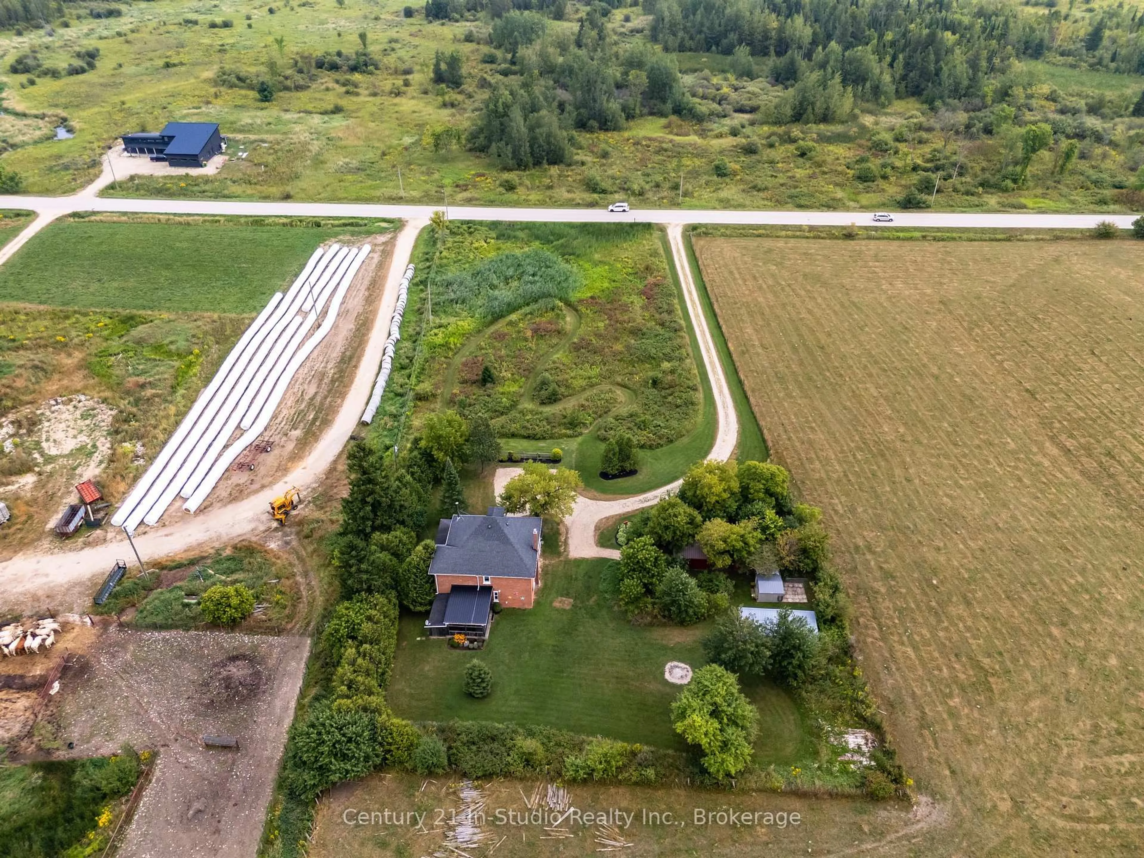 A pic from outside/outdoor area/front of a property/back of a property/a pic from drone, unknown for 155104 7th Line, Grey Highlands Ontario N0C 1H0