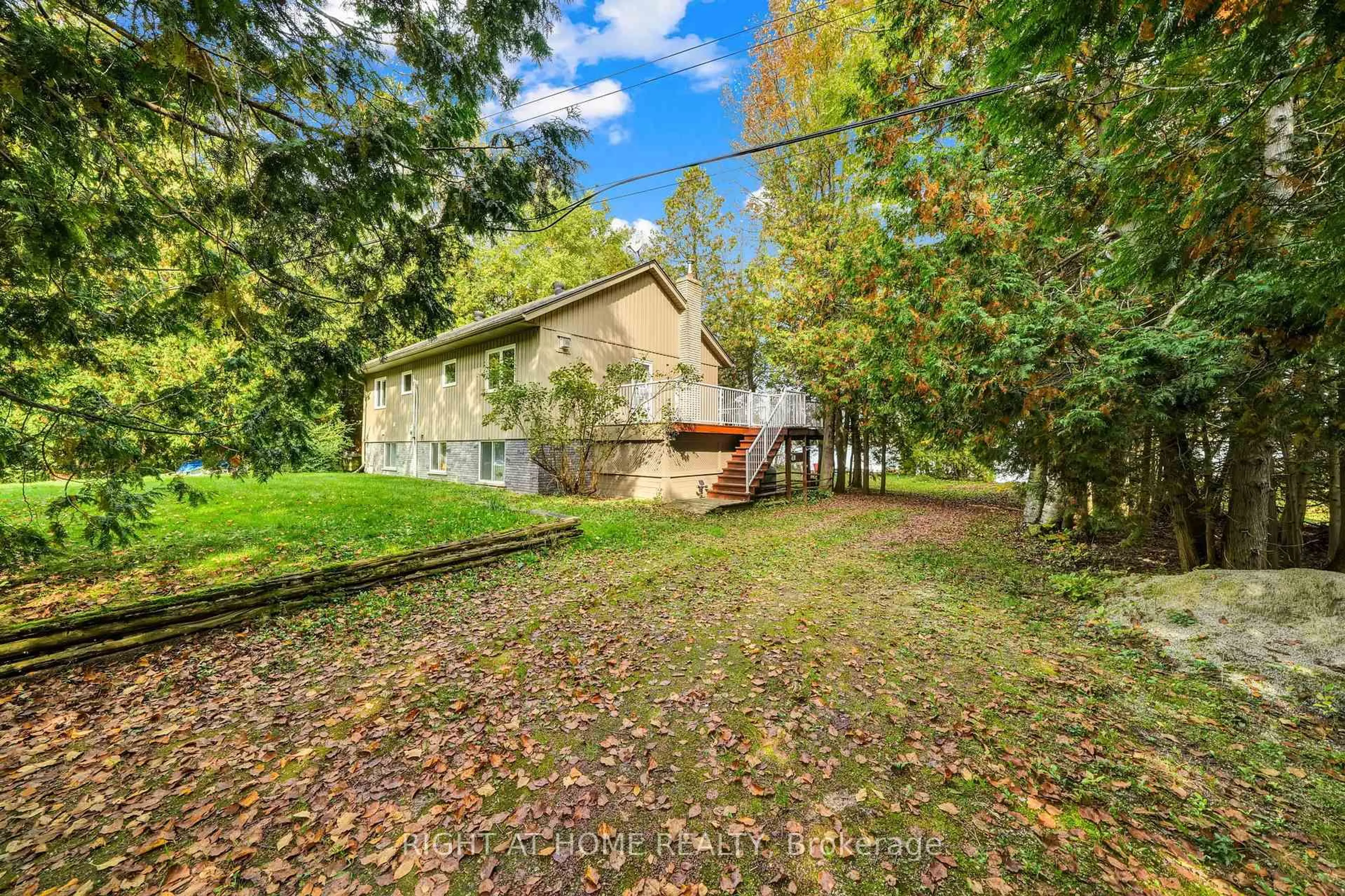 A pic from outside/outdoor area/front of a property/back of a property/a pic from drone, unknown for 135 Browns Lane, Georgian Bluffs Ontario N0H 2K0