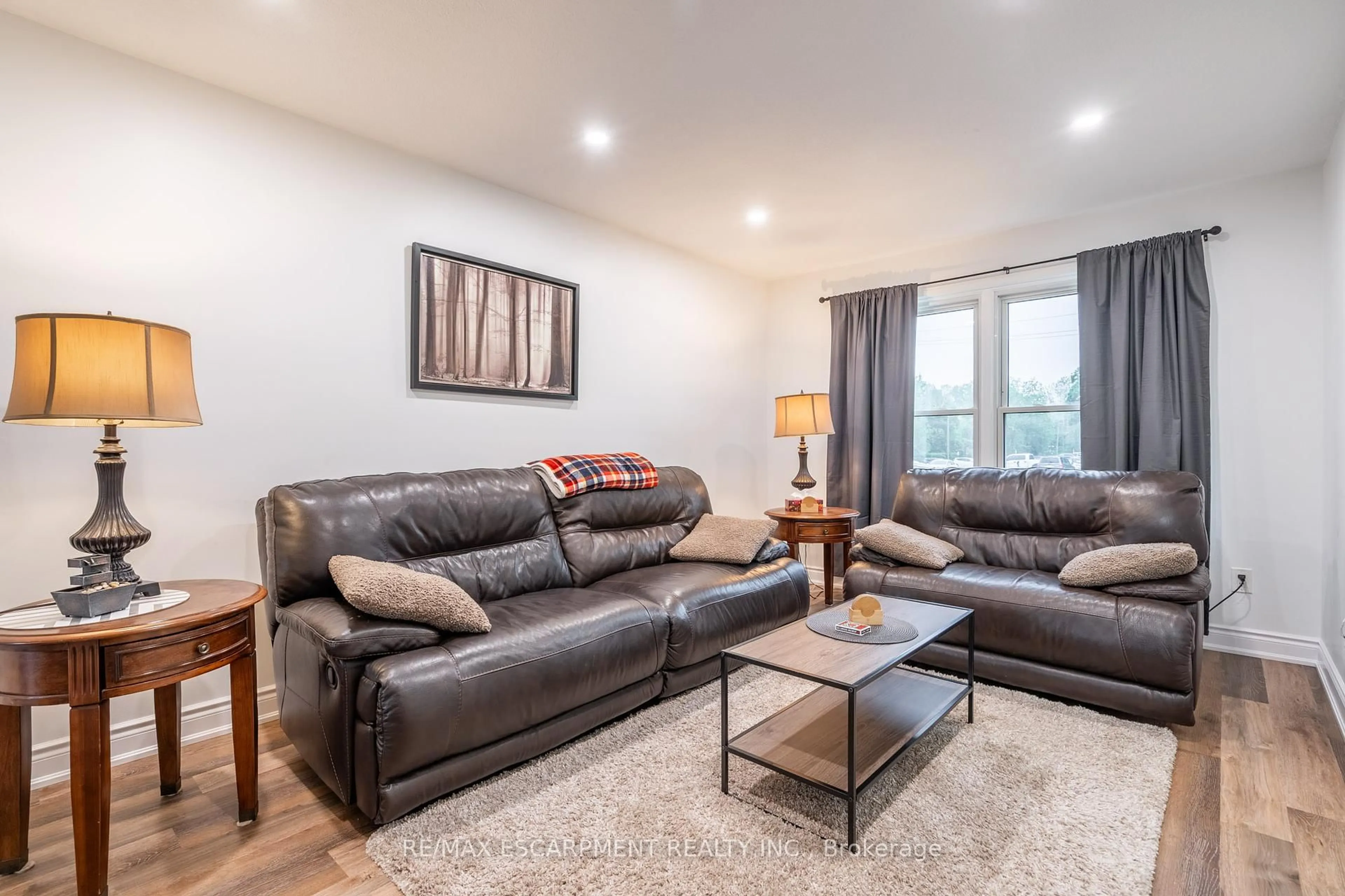 Living room with furniture, unknown for 596 Grey St #8, Brantford Ontario N3S 4Y1