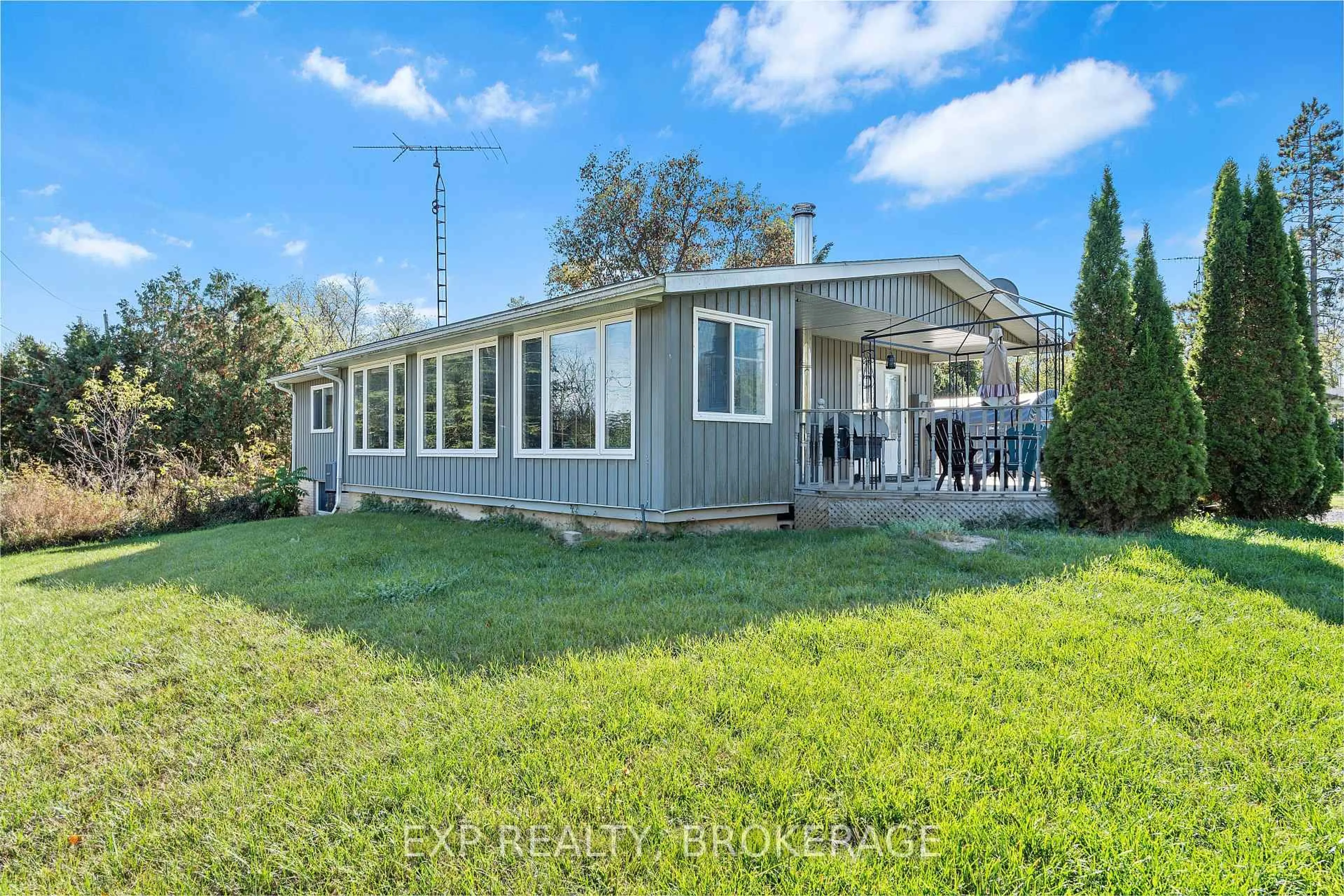 Home with vinyl exterior material, water/lake/river/ocean view for 5425 PETWORTH Rd, Harrowsmith Ontario K0H 1V0