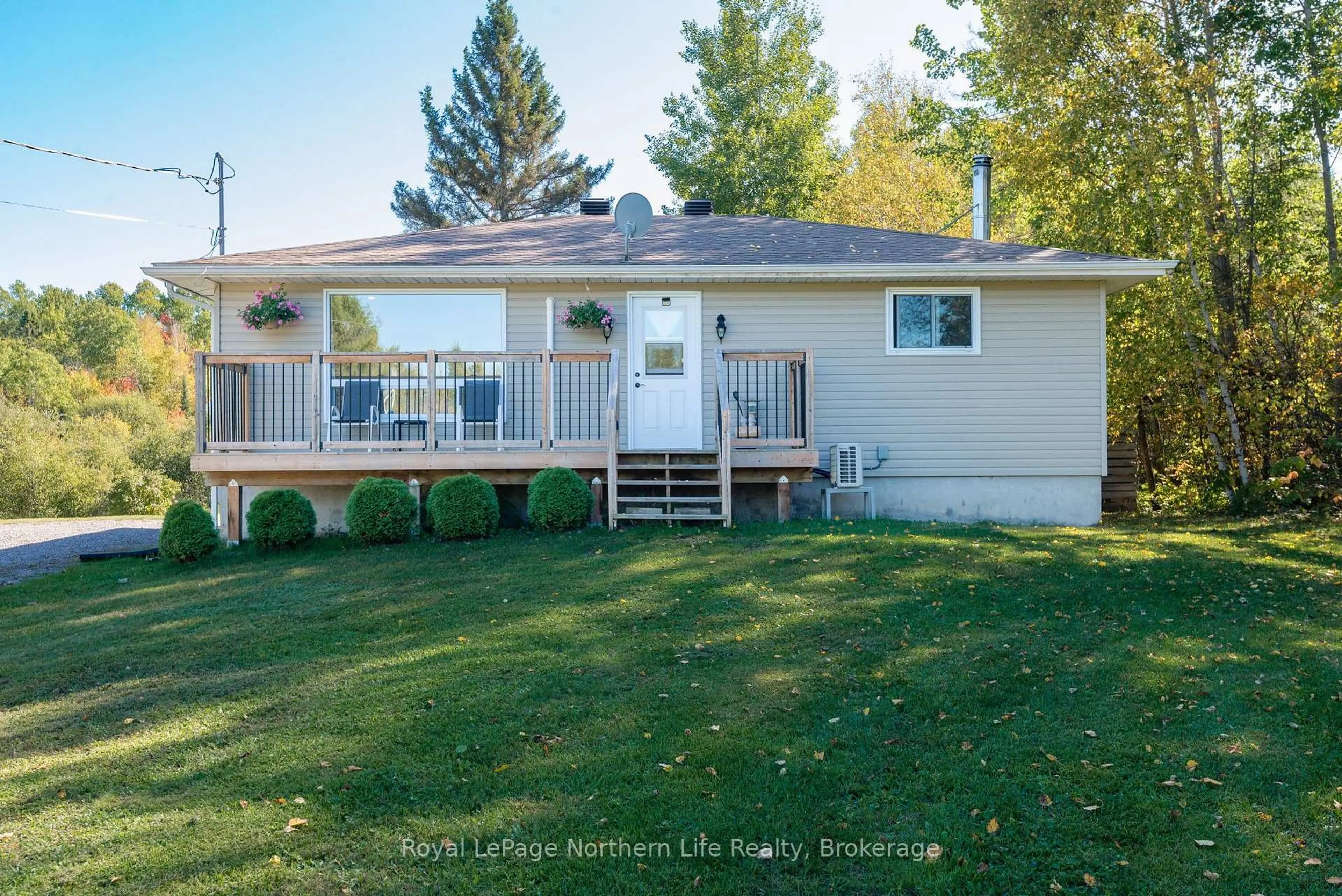Home with vinyl exterior material, street for 554 Lavigne Rd, East Ferris Ontario P0H 1K0