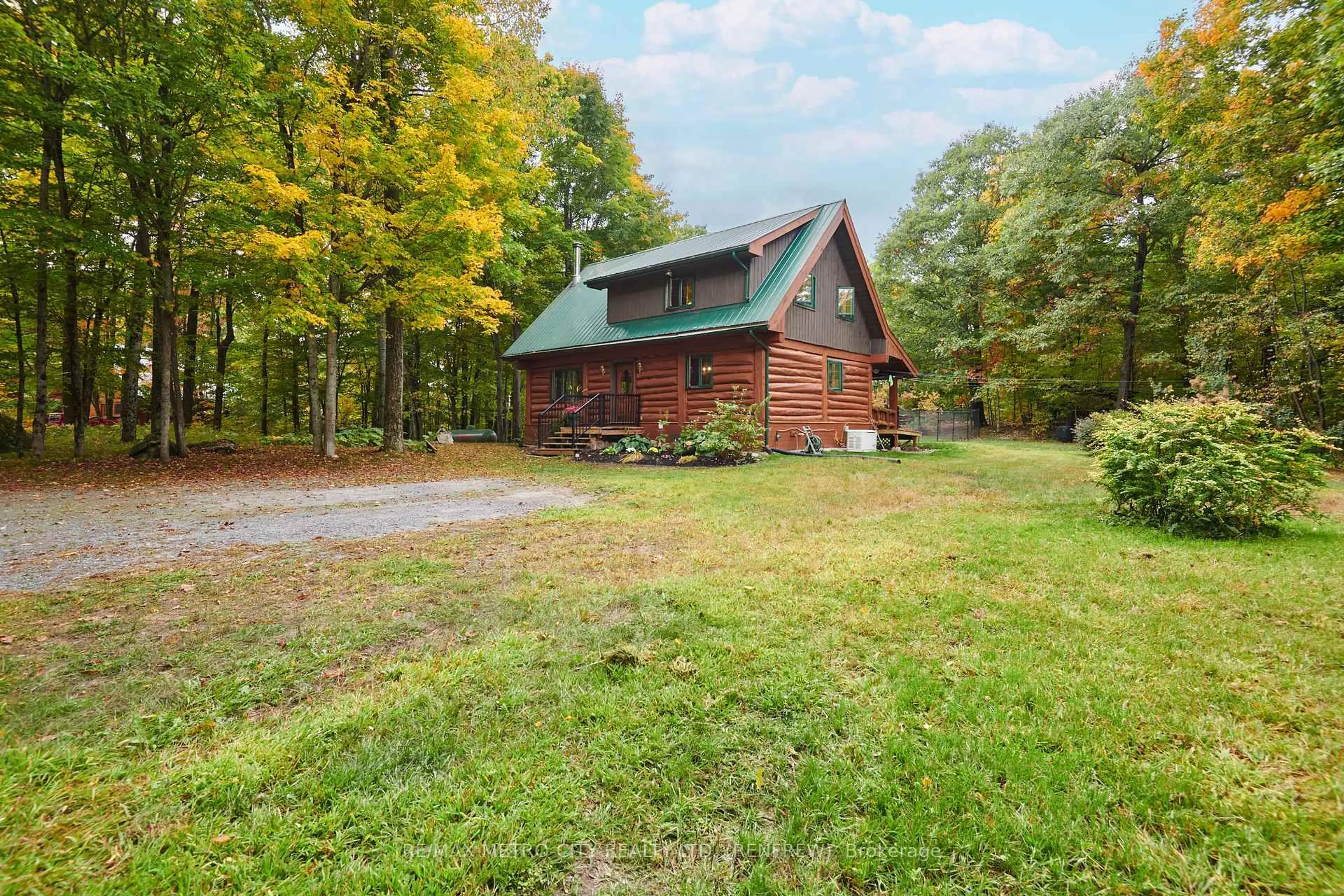 A pic from outside/outdoor area/front of a property/back of a property/a pic from drone, forest/trees view for 109 Scharf Lane, Calabogie Ontario K0J 1H0