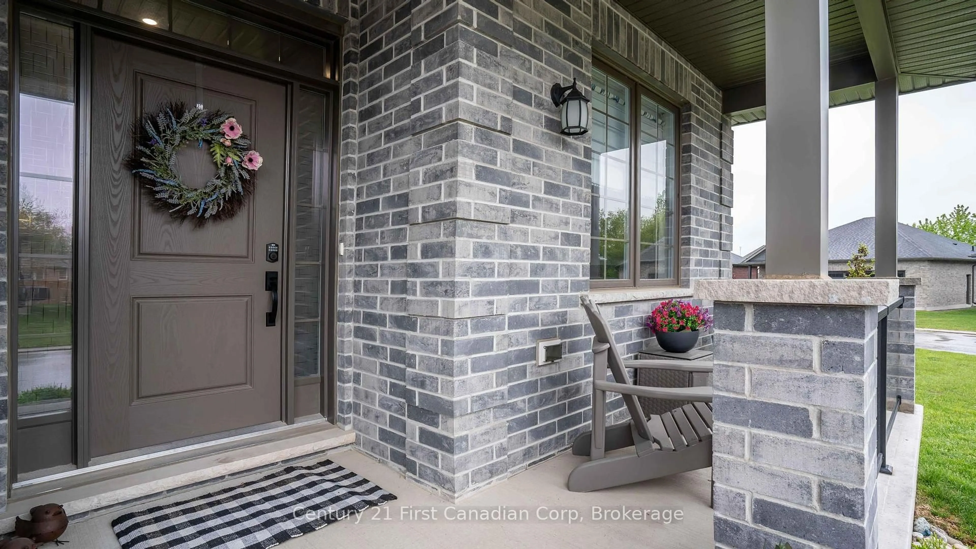 Home with brick exterior material, street for 121 Robin Ridge Dr #35, Central Elgin Ontario L0L 1B0