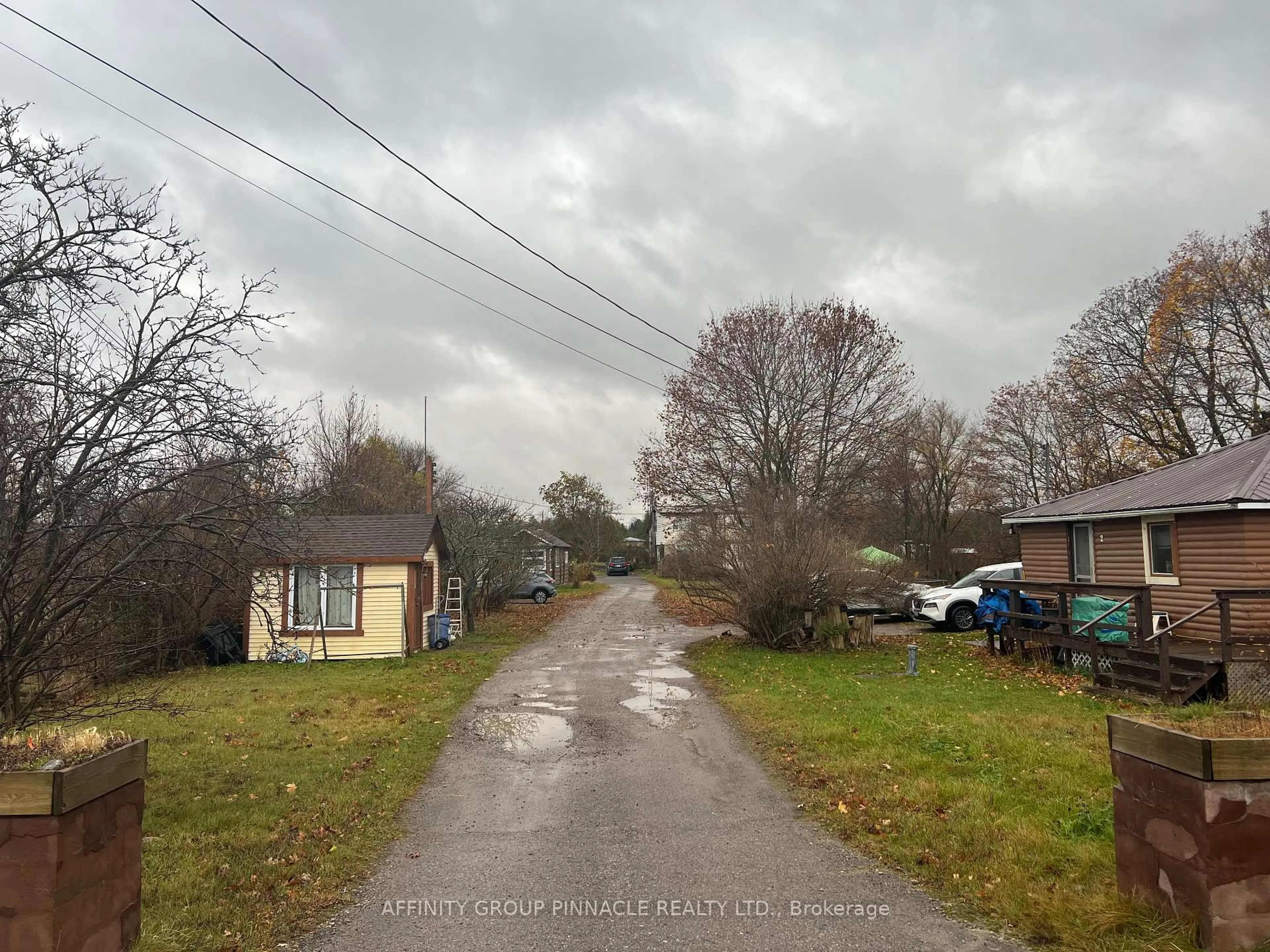 A pic from outside/outdoor area/front of a property/back of a property/a pic from drone, street for 302 County Road 8 Rd, Kawartha Lakes Ontario K0M 1N0