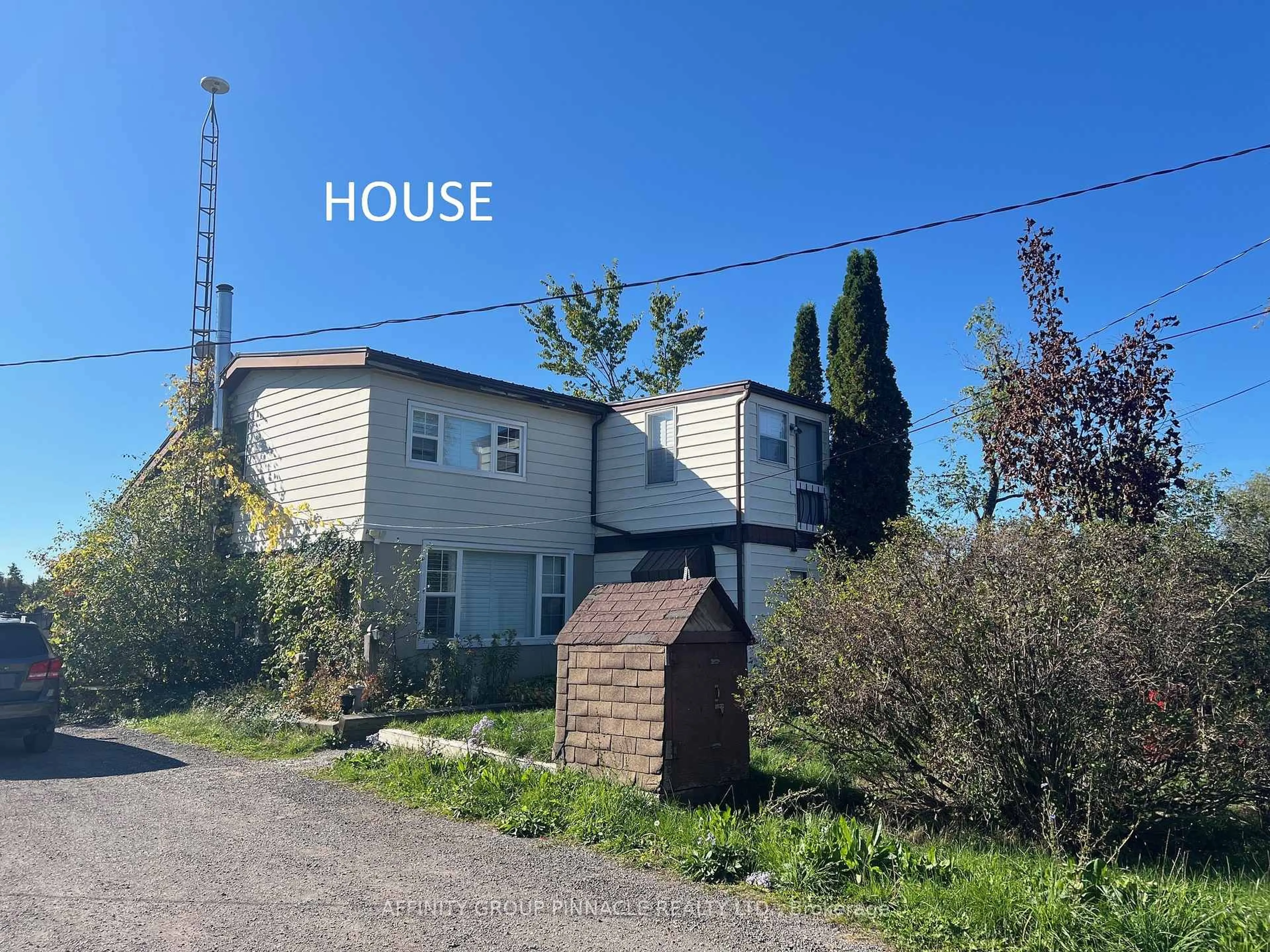 A pic from outside/outdoor area/front of a property/back of a property/a pic from drone, building for 302 County Road 8 Rd, Kawartha Lakes Ontario K0M 1N0