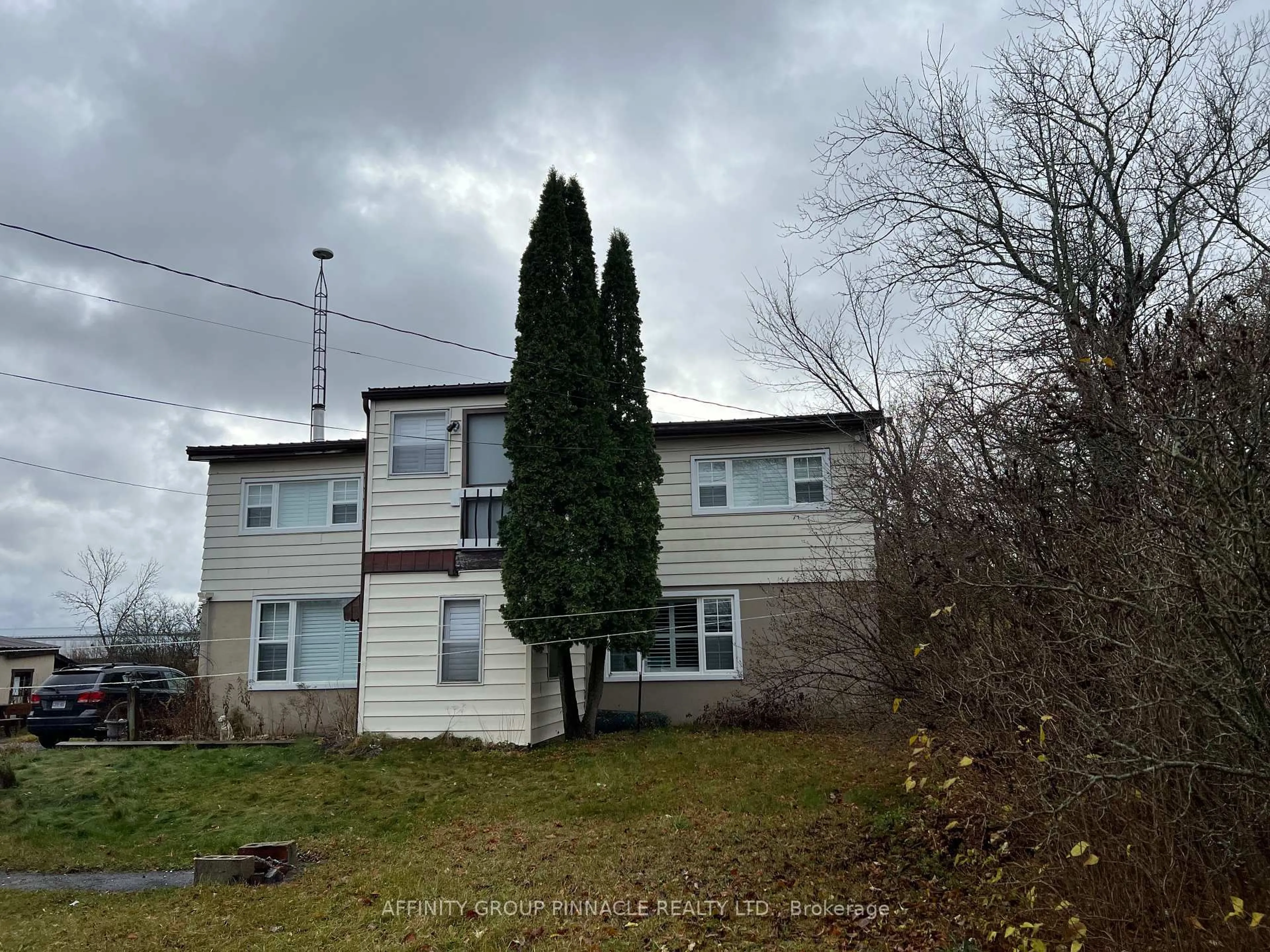 A pic from outside/outdoor area/front of a property/back of a property/a pic from drone, building for 302 County Road 8 Rd, Kawartha Lakes Ontario K0M 1N0