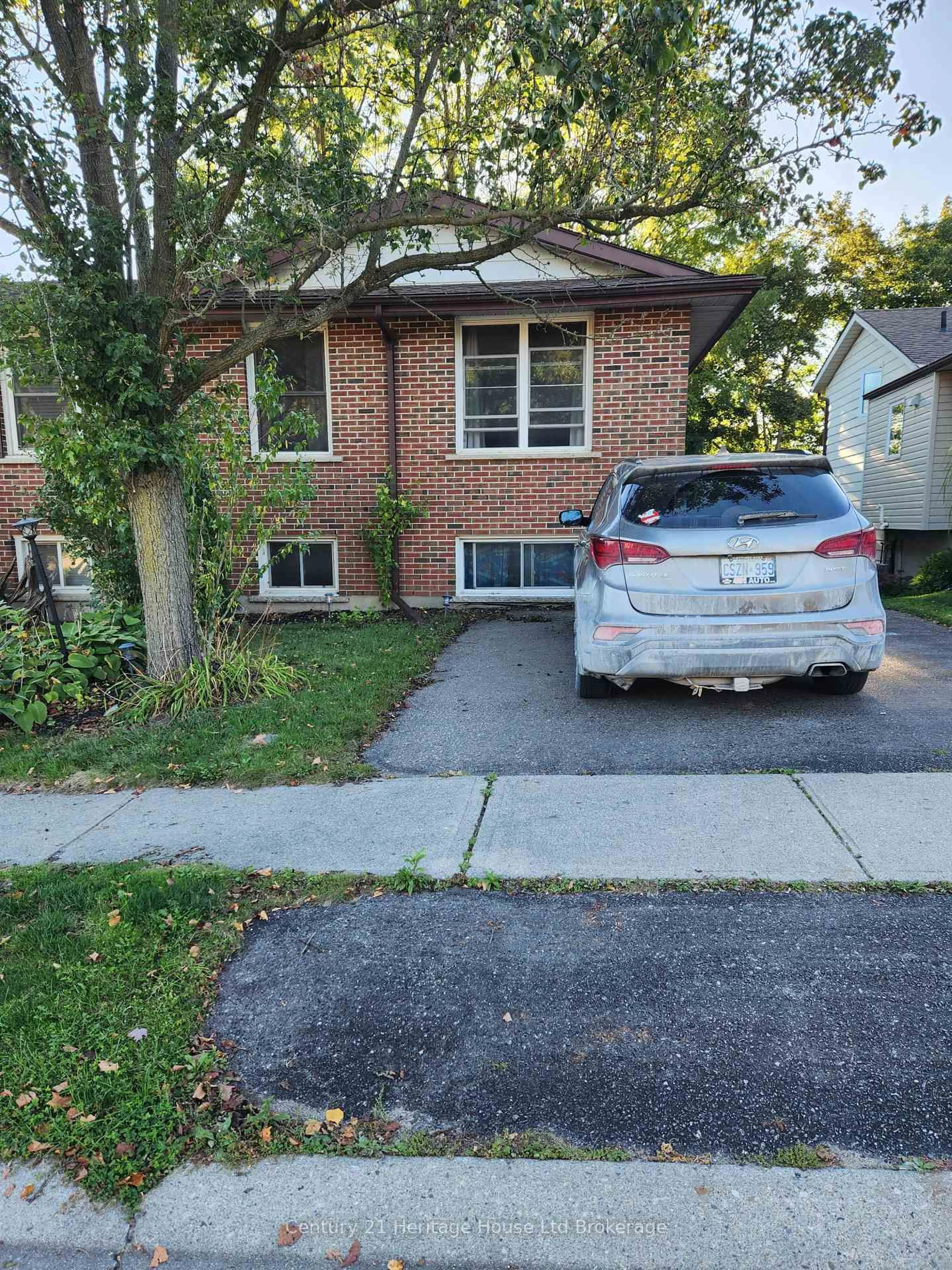Home with brick exterior material, street for 140 Dover St, Woodstock Ontario N4S 3M1