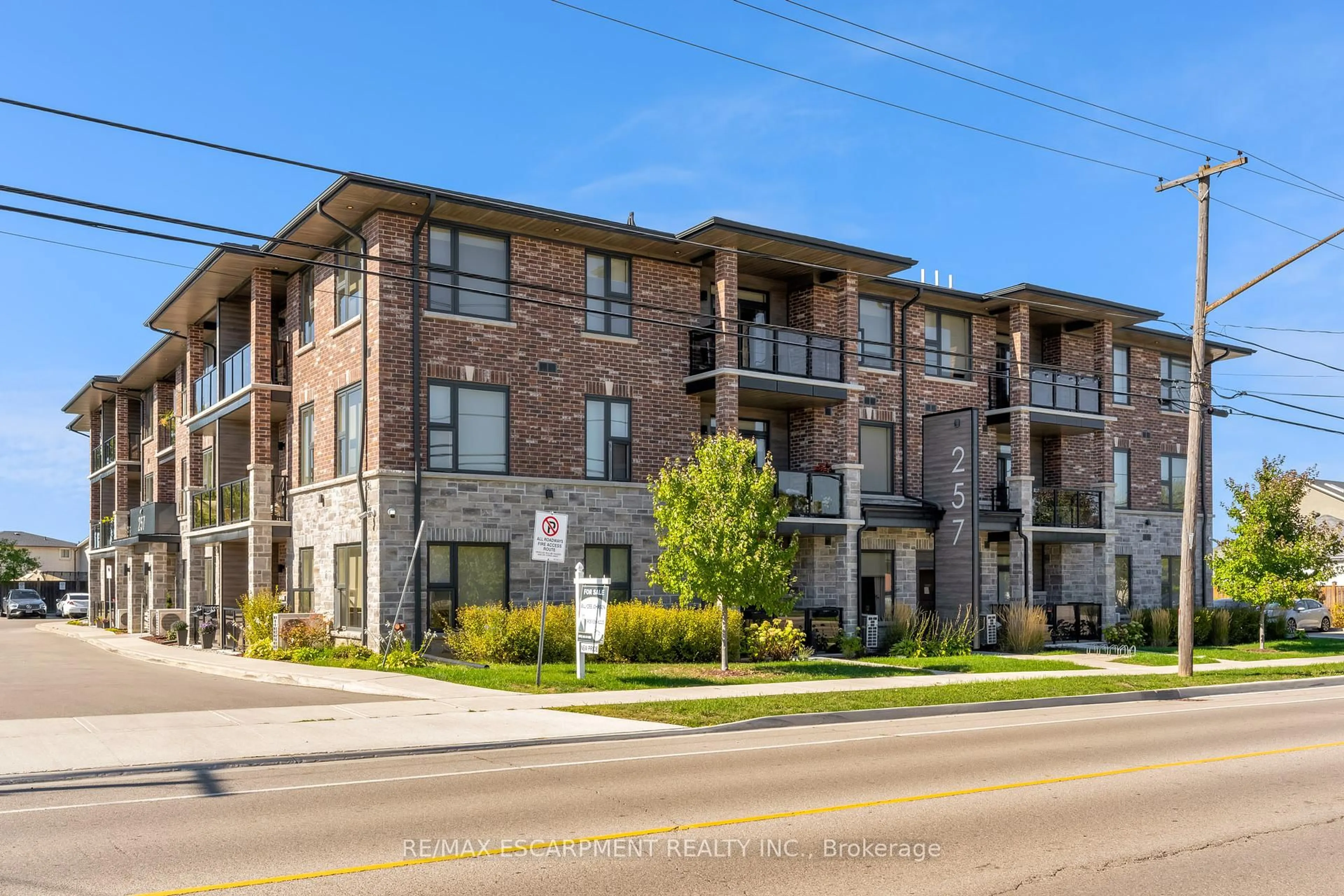 Home with brick exterior material, street for 257 Millen Rd #209, Hamilton Ontario L8E 2H1