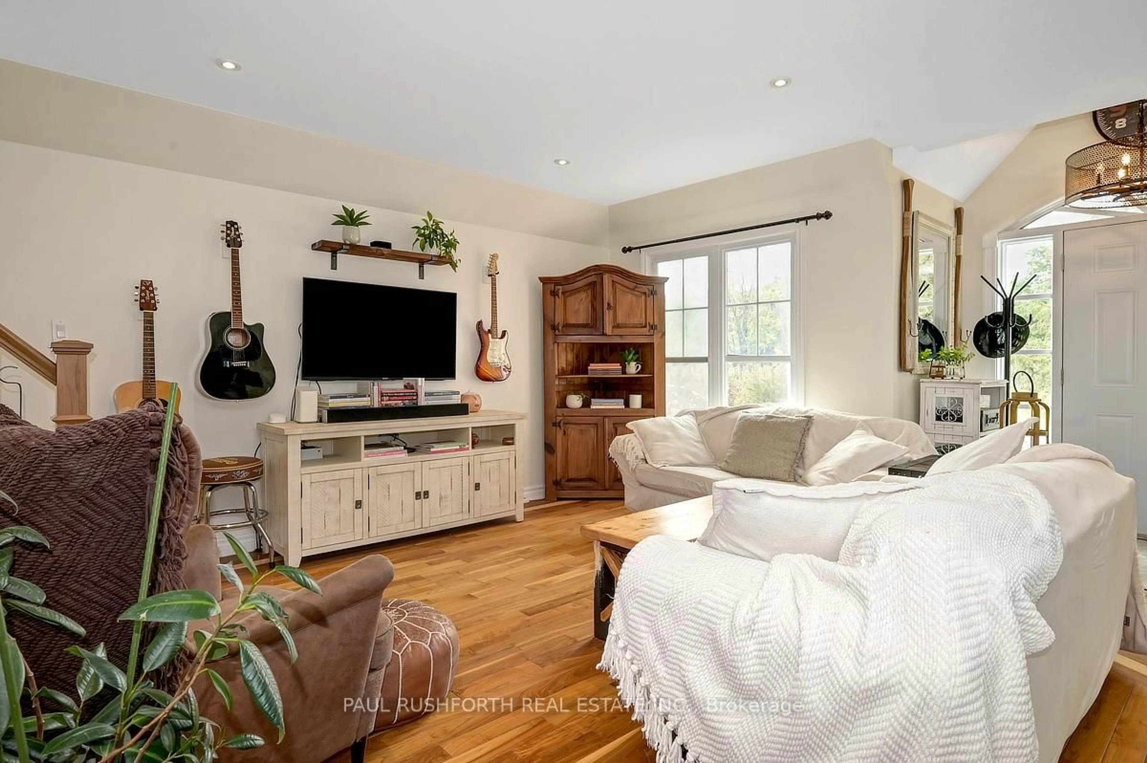 Living room with furniture, wood/laminate floor for 3729 Prudhomme Rd, Alfred and Plantagenet Ontario K0A 3K0
